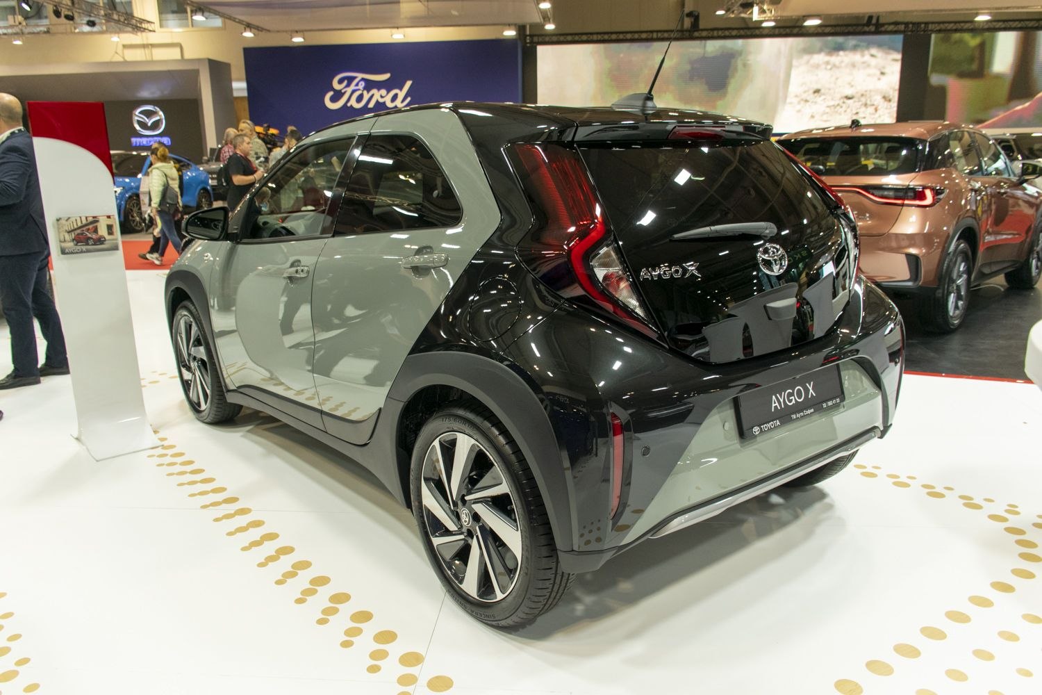 Rear view with distinctive taillights and two-tone body