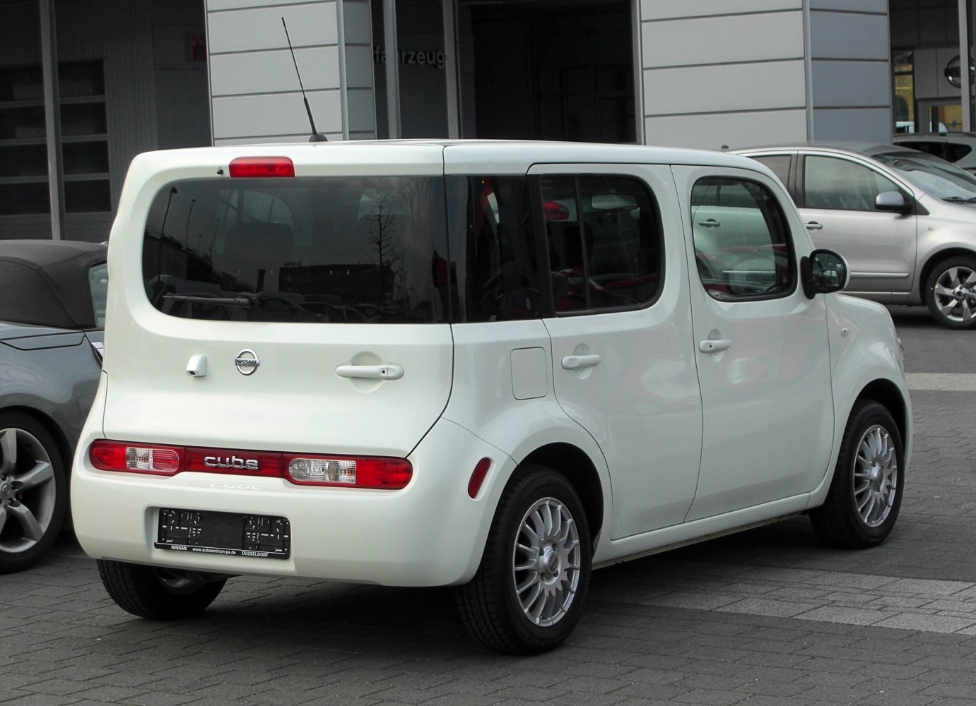 Boxy rear and side view with unique rear door
