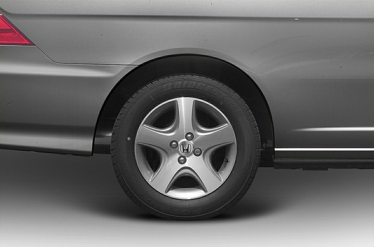 Close-up of alloy wheel and Bridgestone tire on rear side