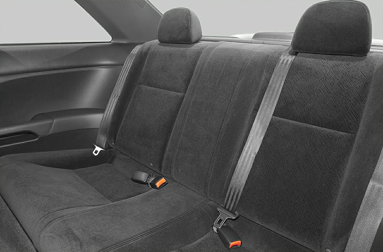 Rear seat with fabric upholstery, headrests, and seat belts