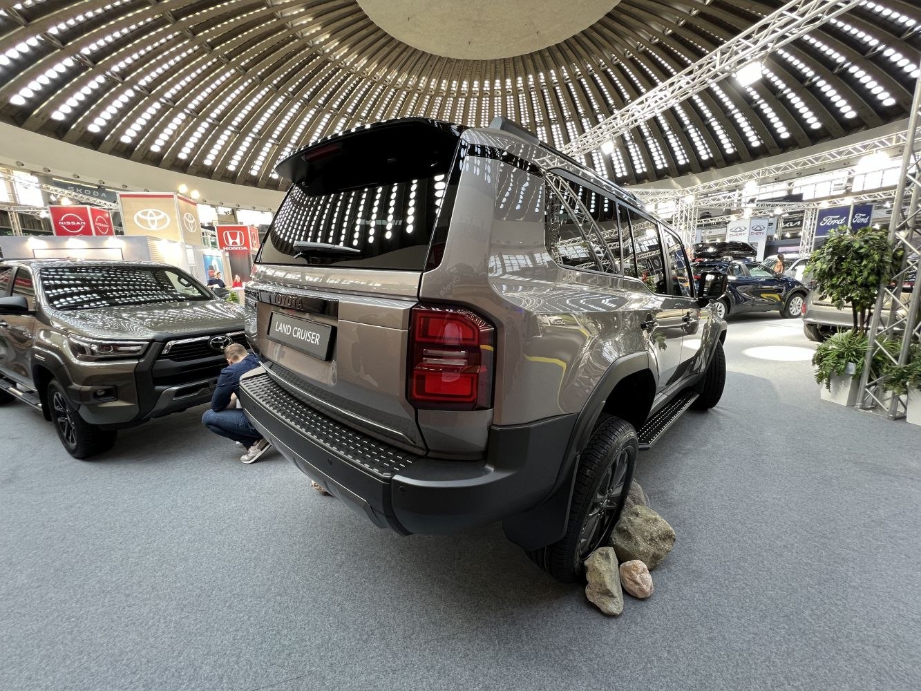 Rear view of SUV with off-road rocks and rugged design features