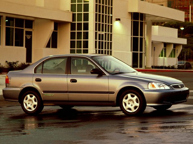 Classic 1995 sedan side profile with alloy wheels