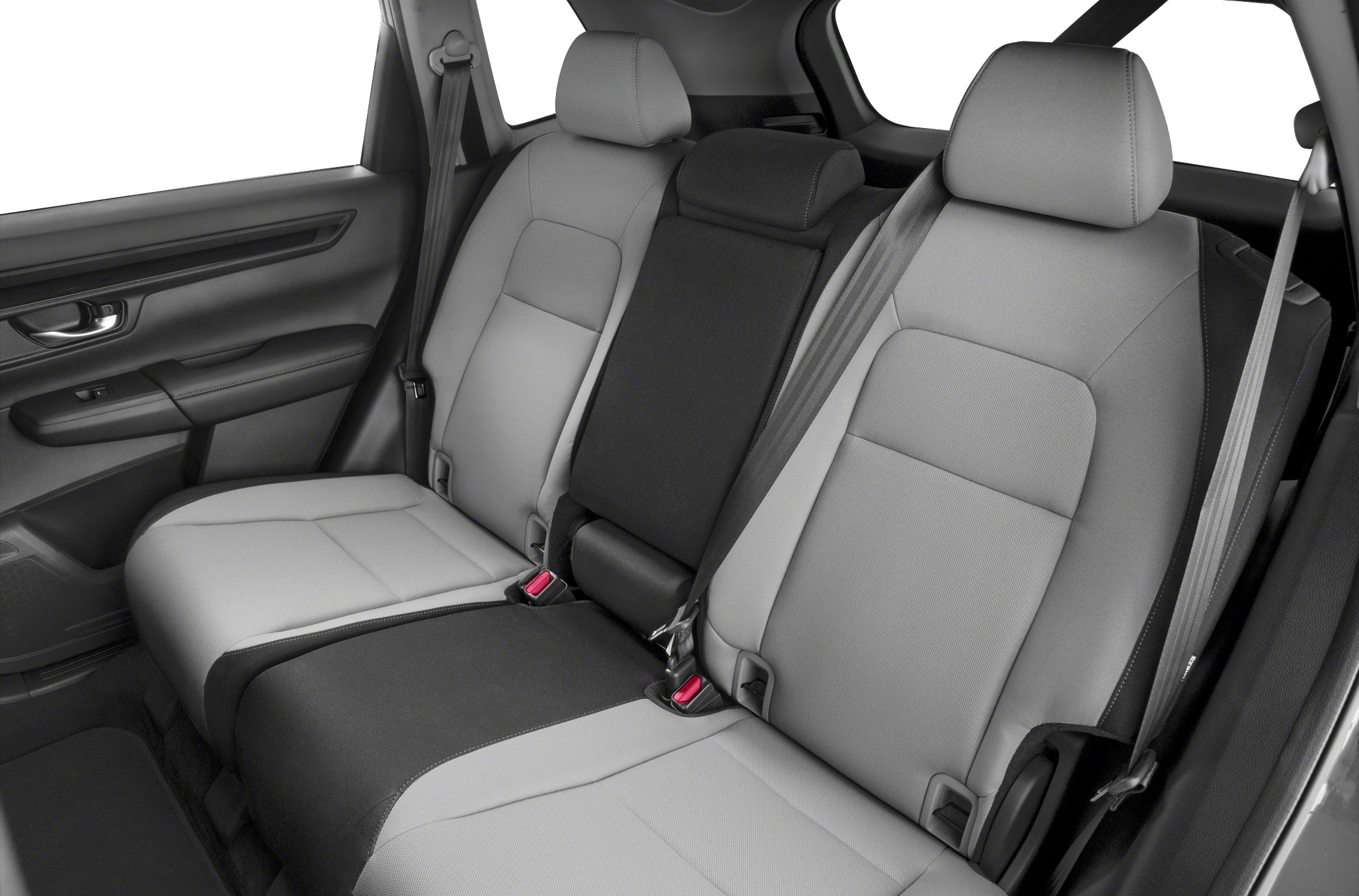 Rear passenger seating with two-tone upholstery and integrated seatbelts