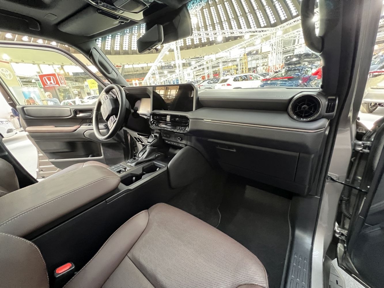 Interior dashboard and premium seating with digital display and controls