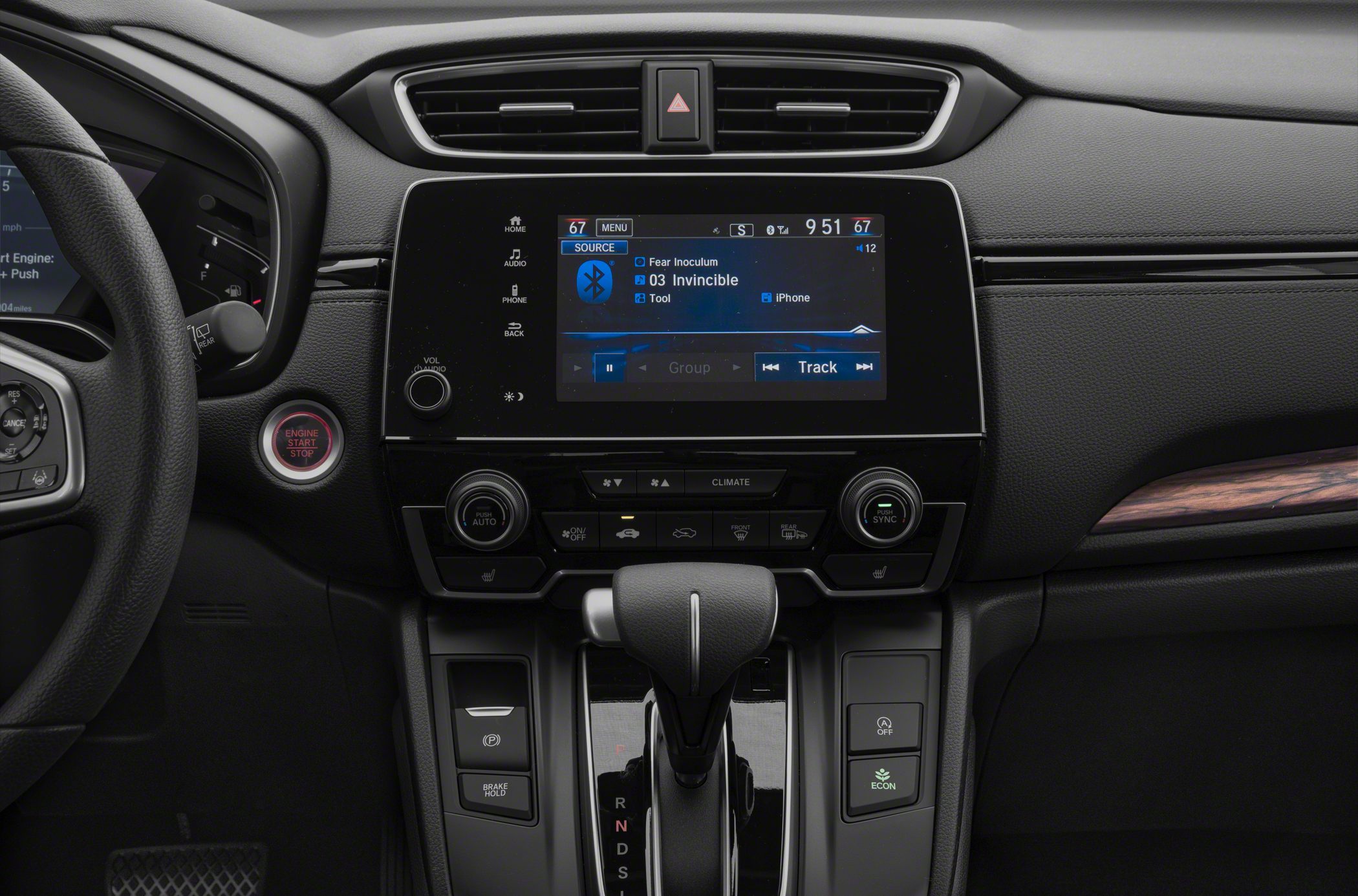 Touchscreen infotainment and automatic gear shift console
