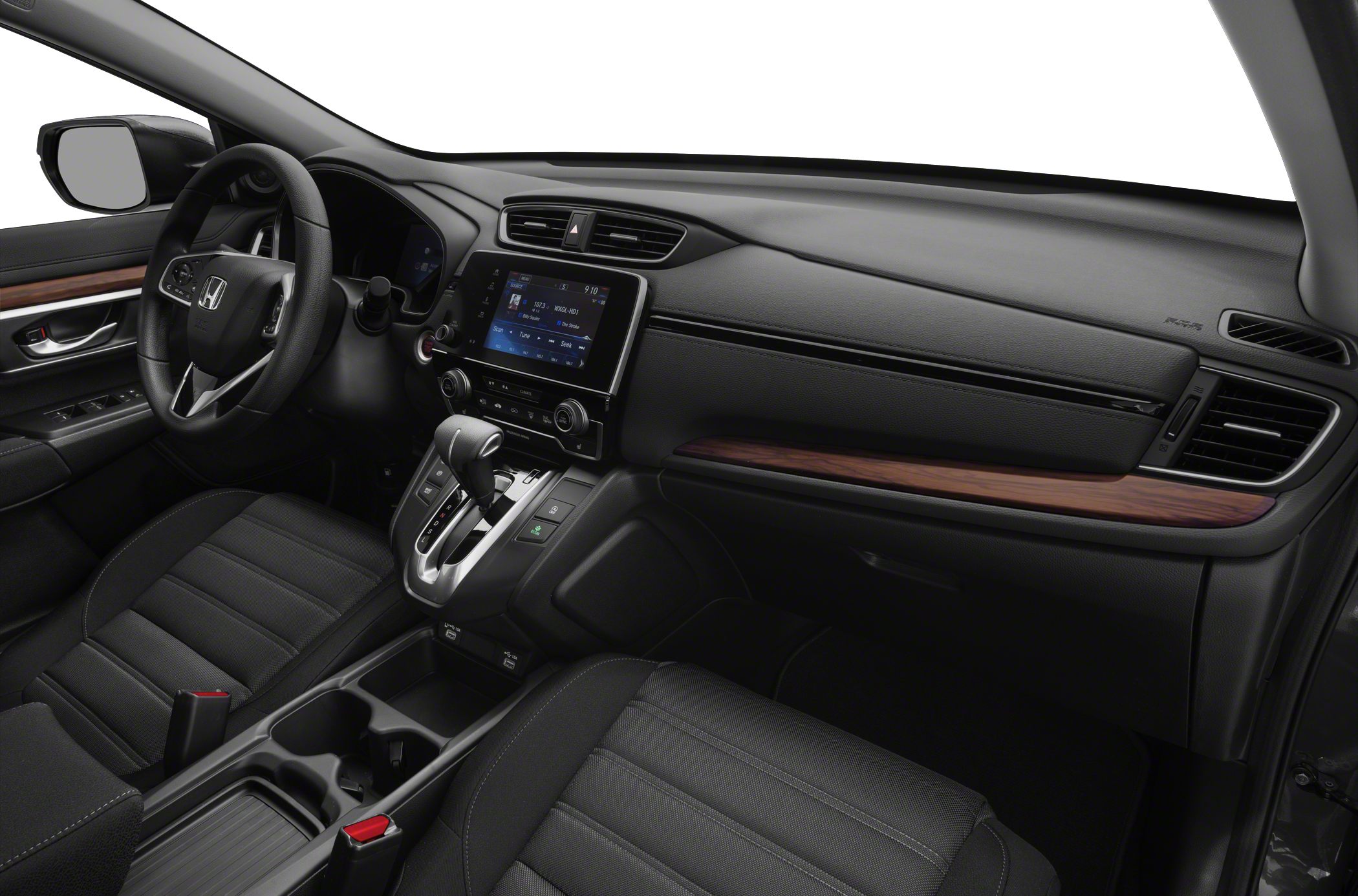 Dashboard with touchscreen, gear shift, and wood trim