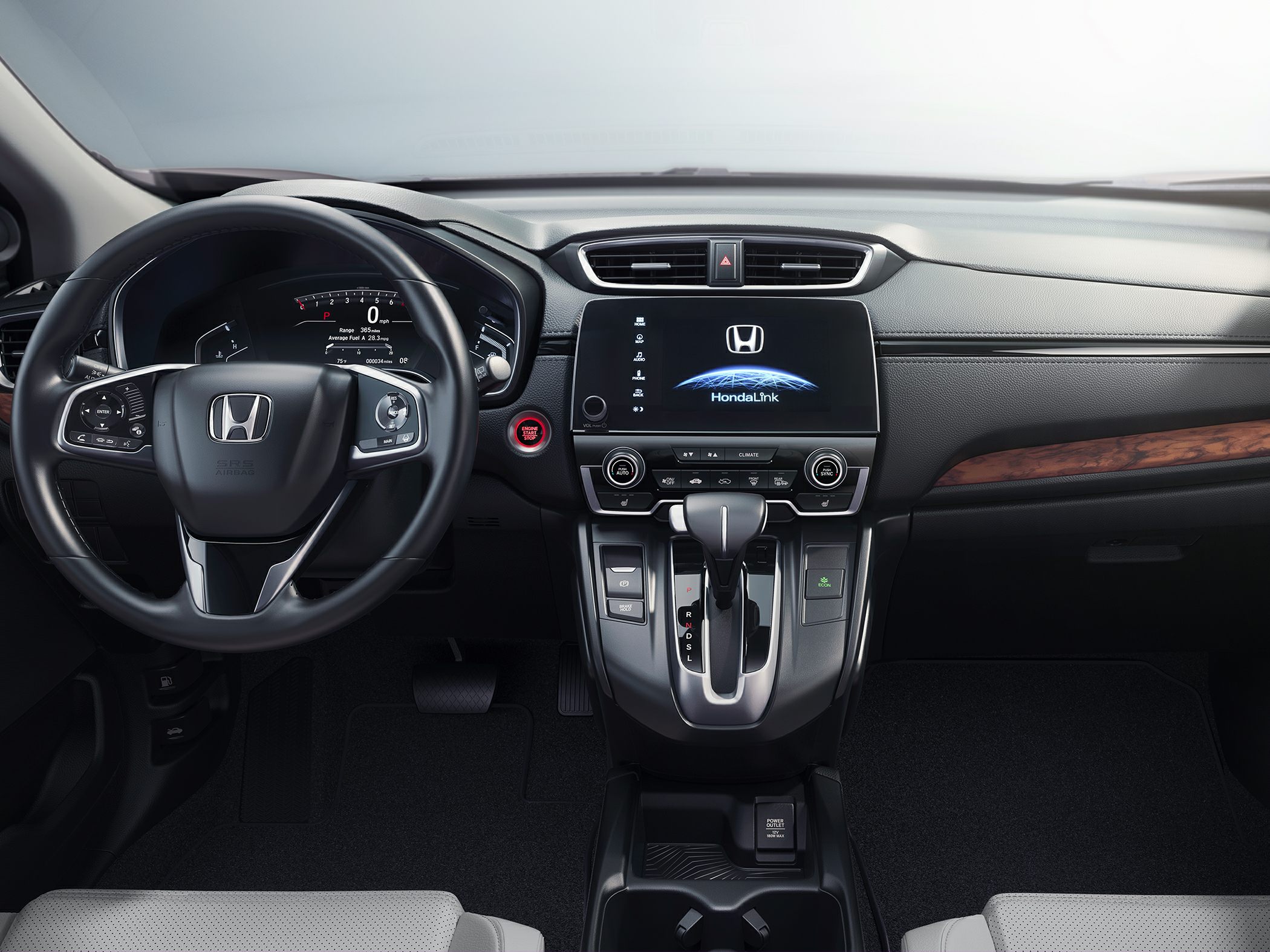 Modern car interior dashboard with touchscreen and steering wheel