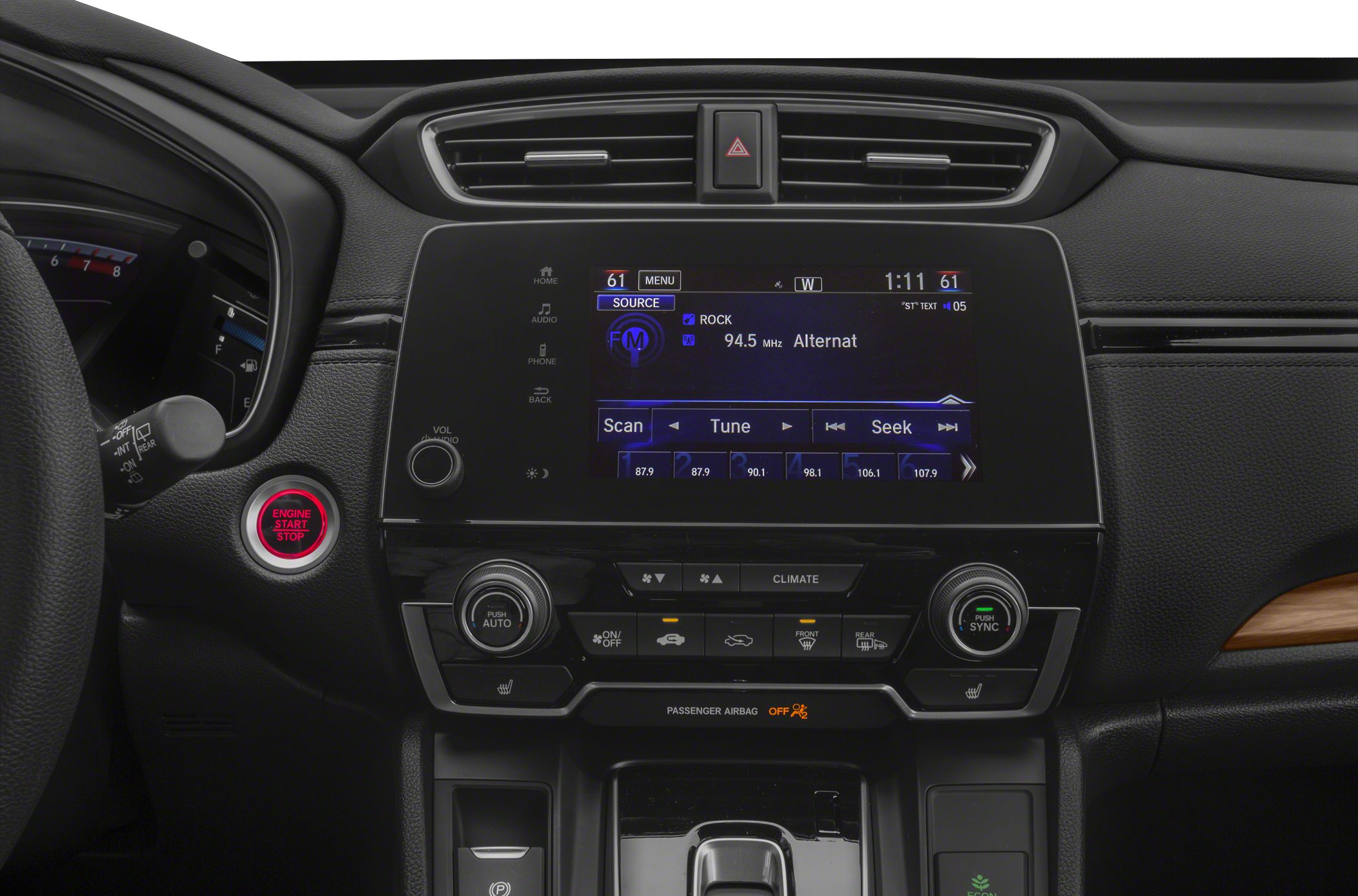 Center console with touchscreen infotainment and climate control buttons