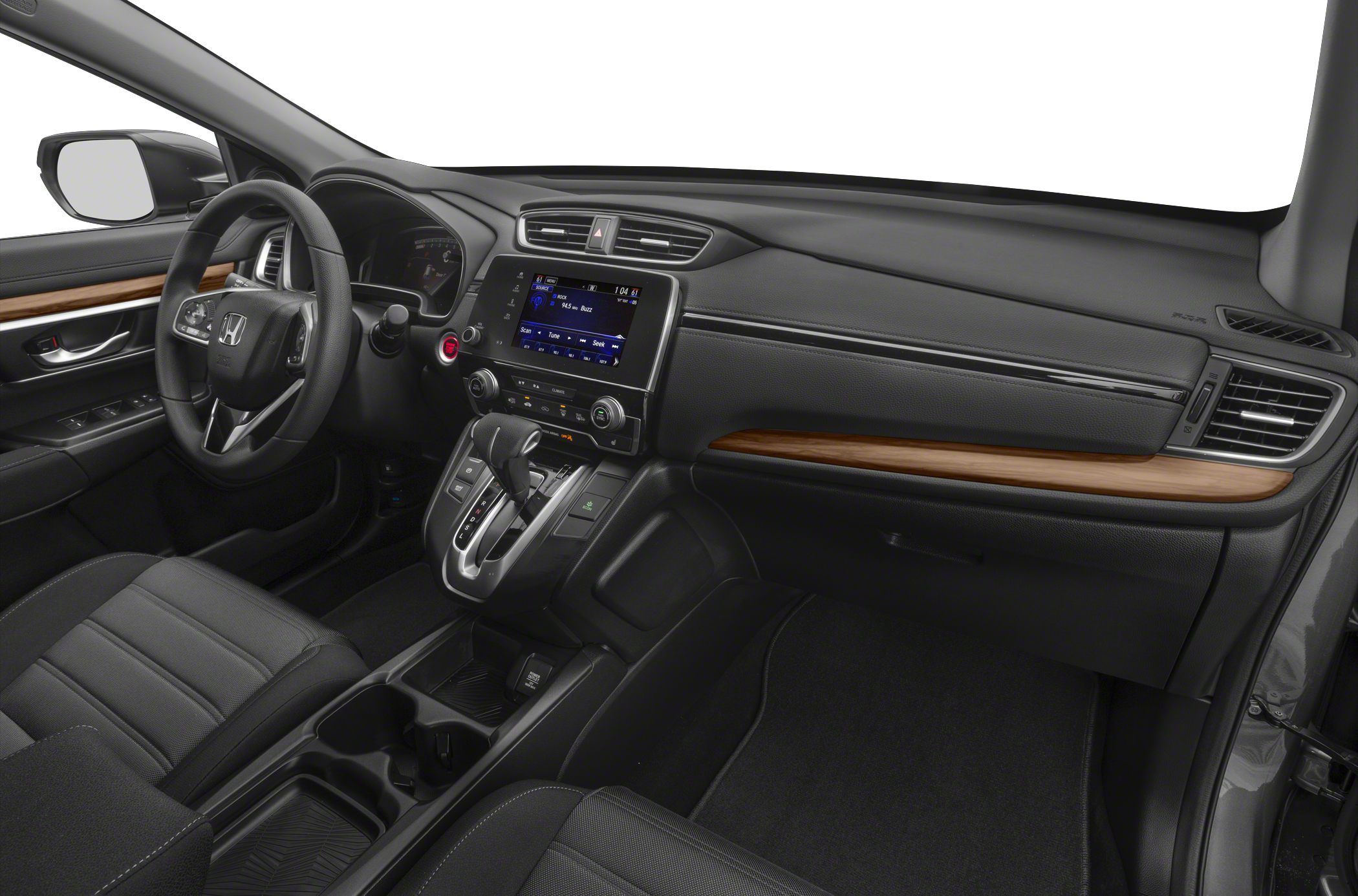 Interior dashboard and steering wheel with wood trim and infotainment system