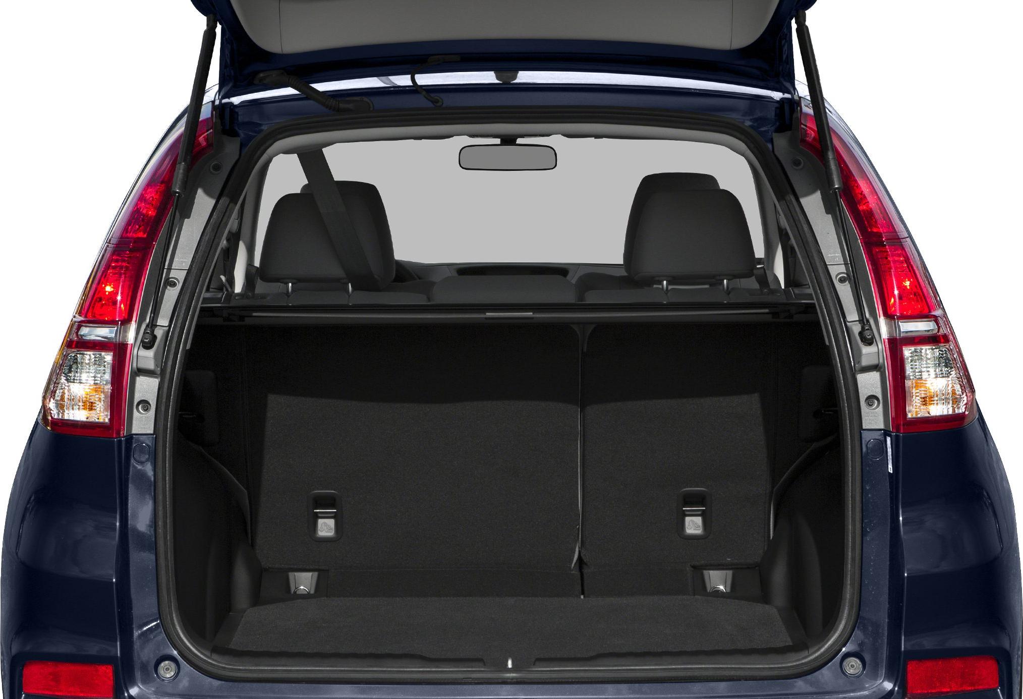 Open rear trunk space and visible rear seats with seatbelt.