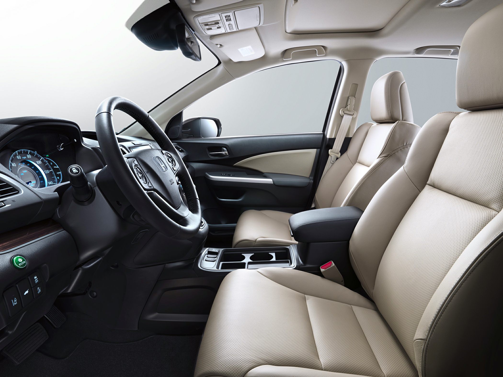 Beige leather front seats and modern dashboard interior