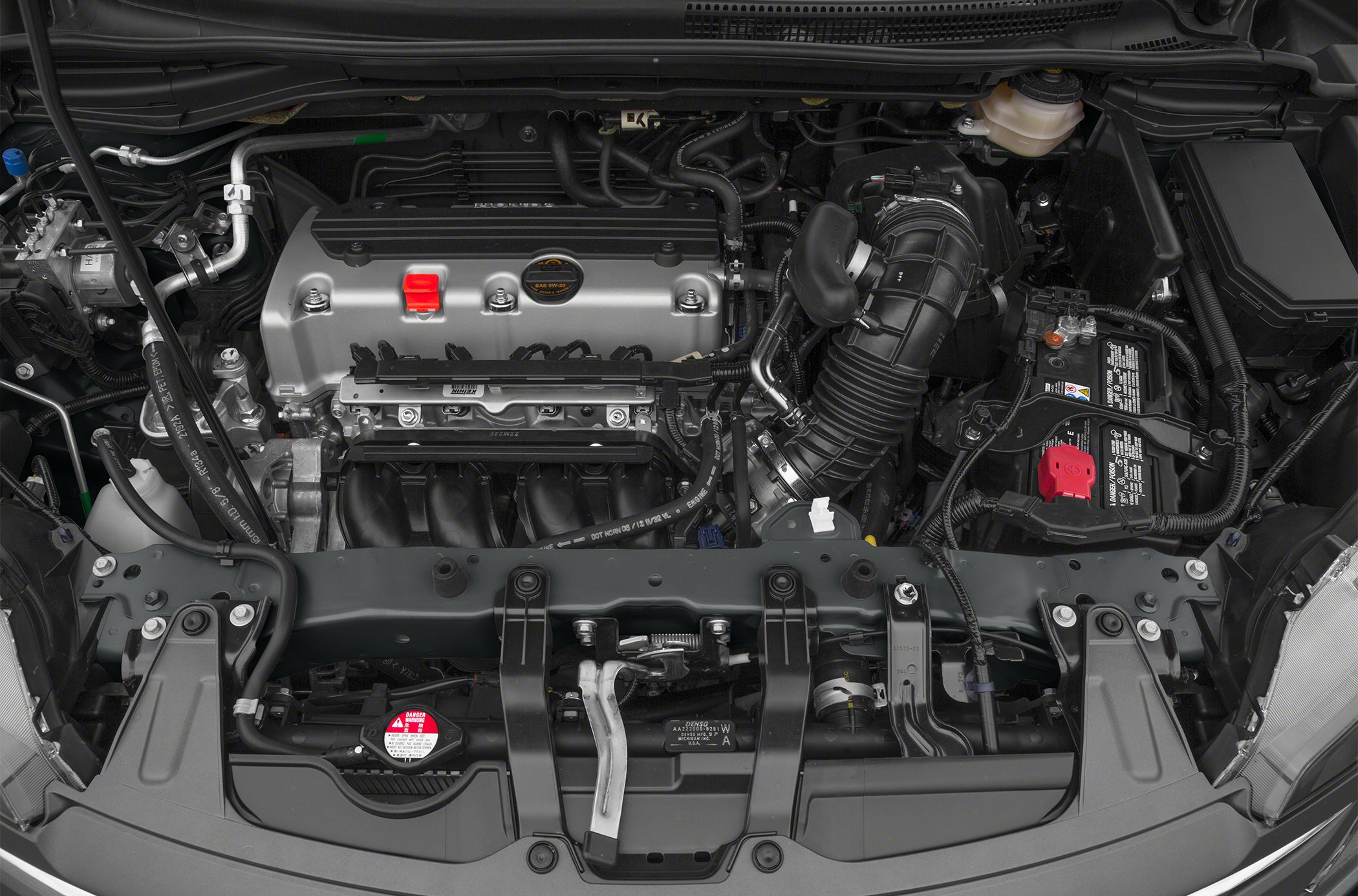 Clean and organized engine bay with visible air intake and battery