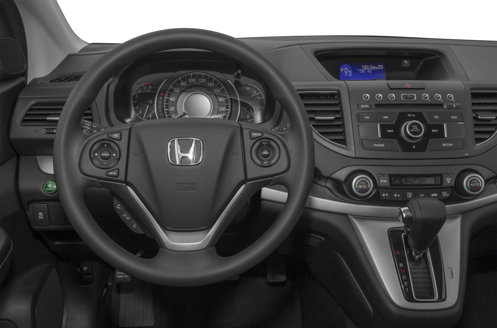 Steering wheel with controls and dashboard with central console and automatic gearshift