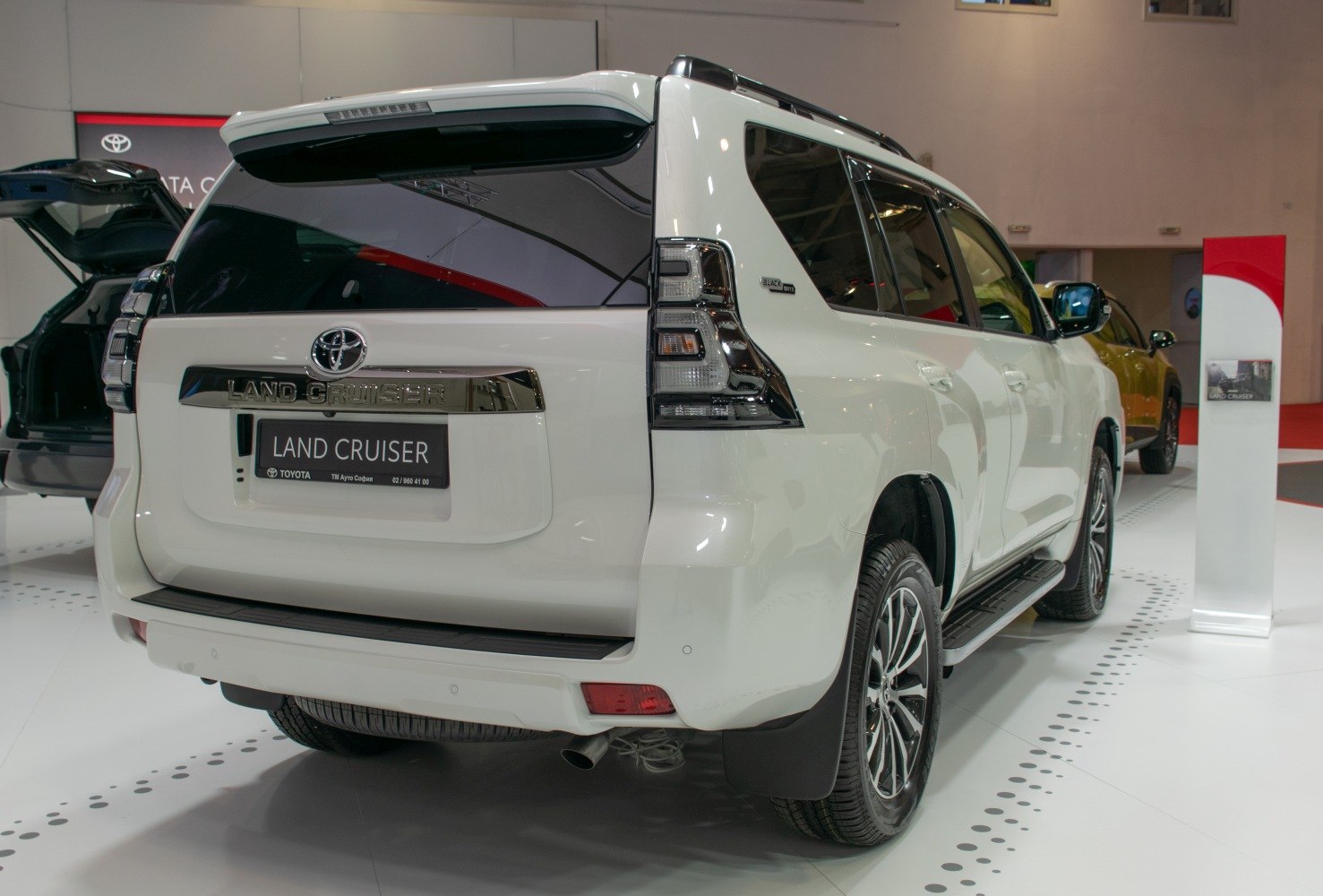 Rear perspective of facelifted Toyota SUV with distinctive taillights