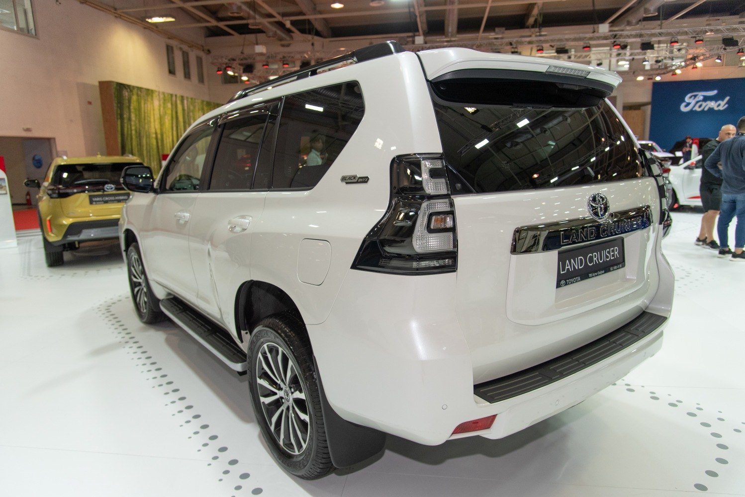 Rear and side view with tail lights and black onyx badge