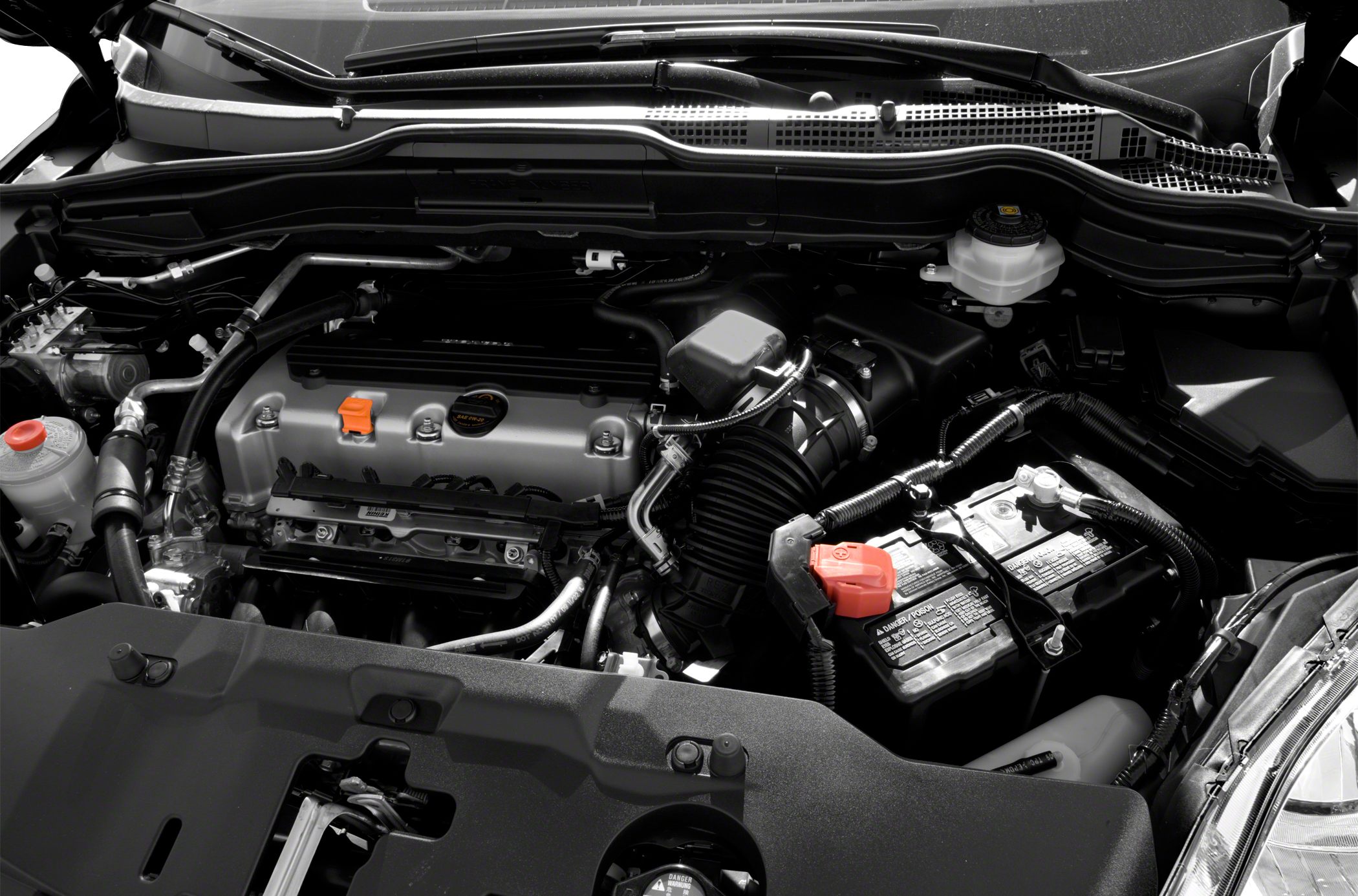 Engine compartment with battery and air intake system
