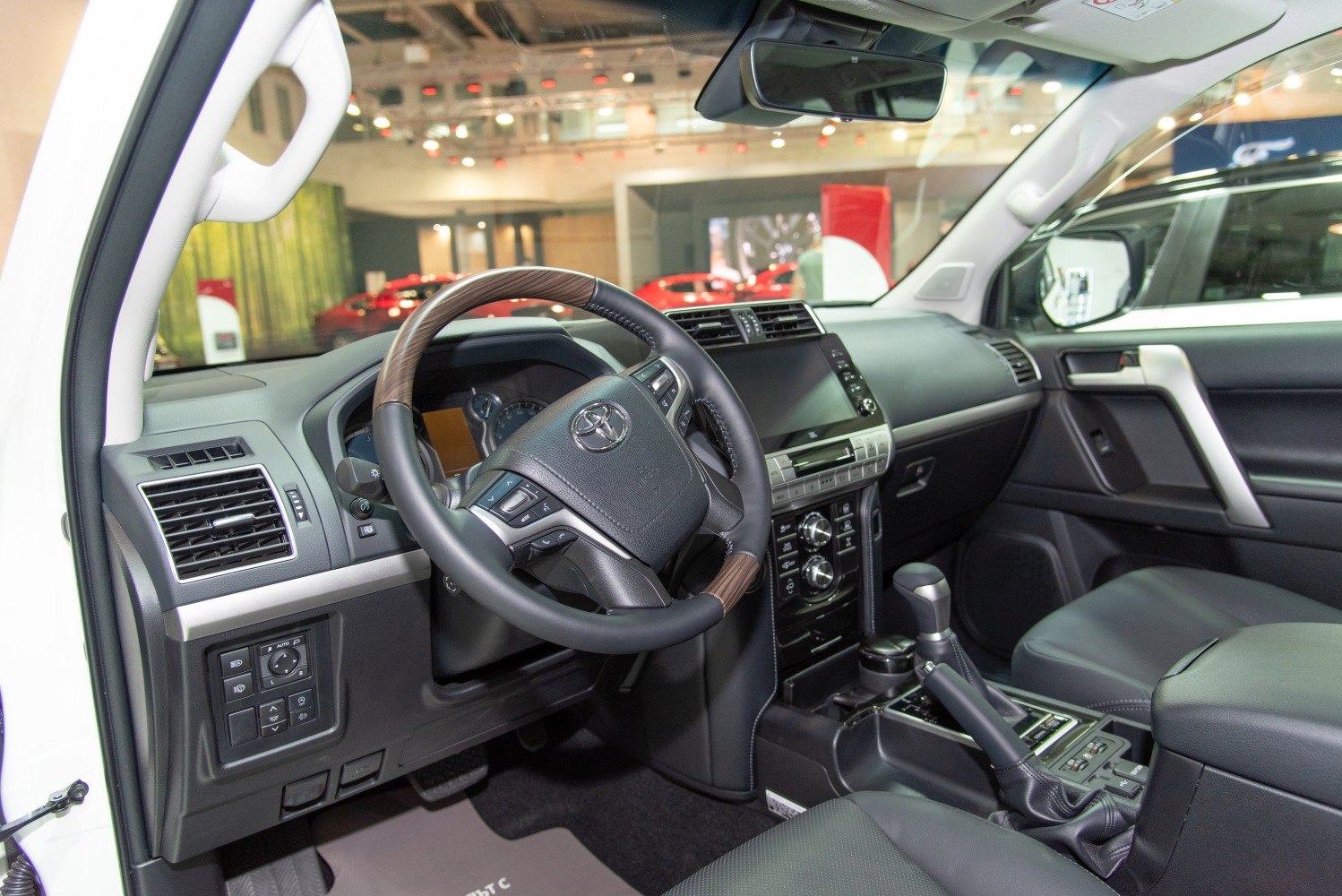 Interior dashboard with steering wheel and infotainment system