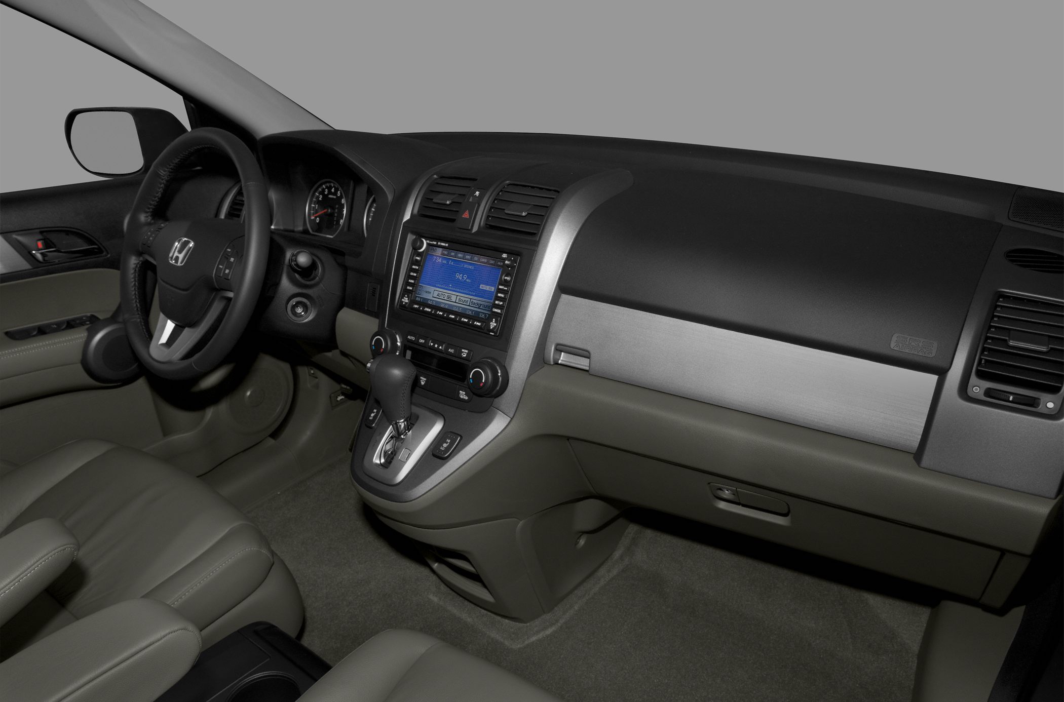 Dashboard, steering wheel, gear shift, and infotainment system interior