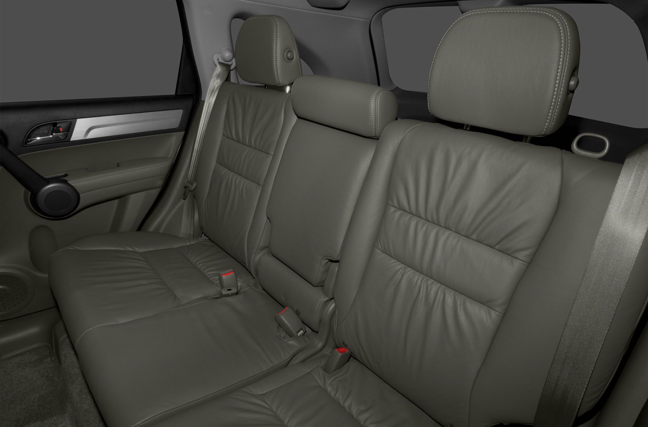 Leather rear seats with adjustable headrests and seat belts