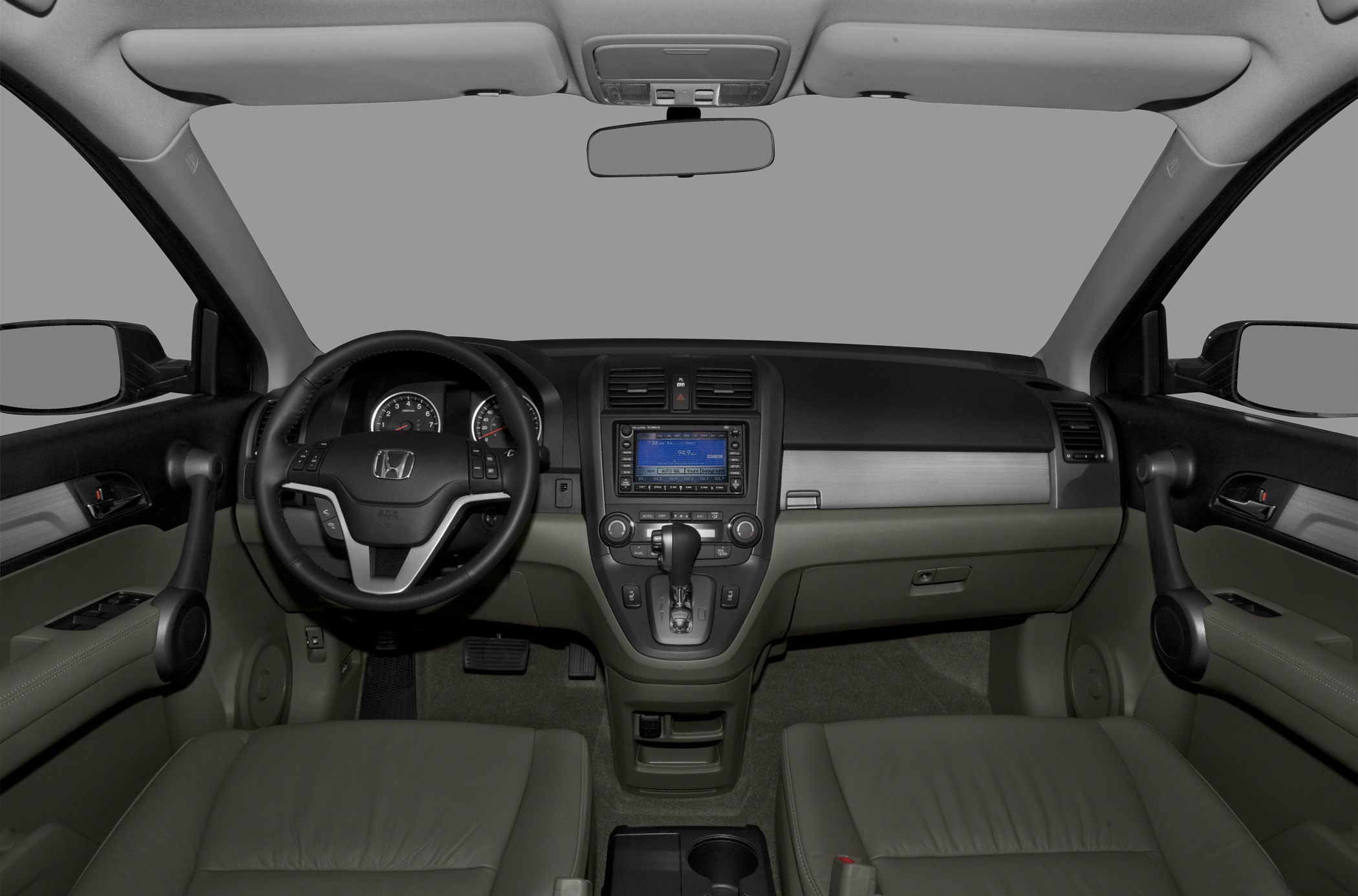 Dashboard, steering wheel, and center console of a modern SUV interior