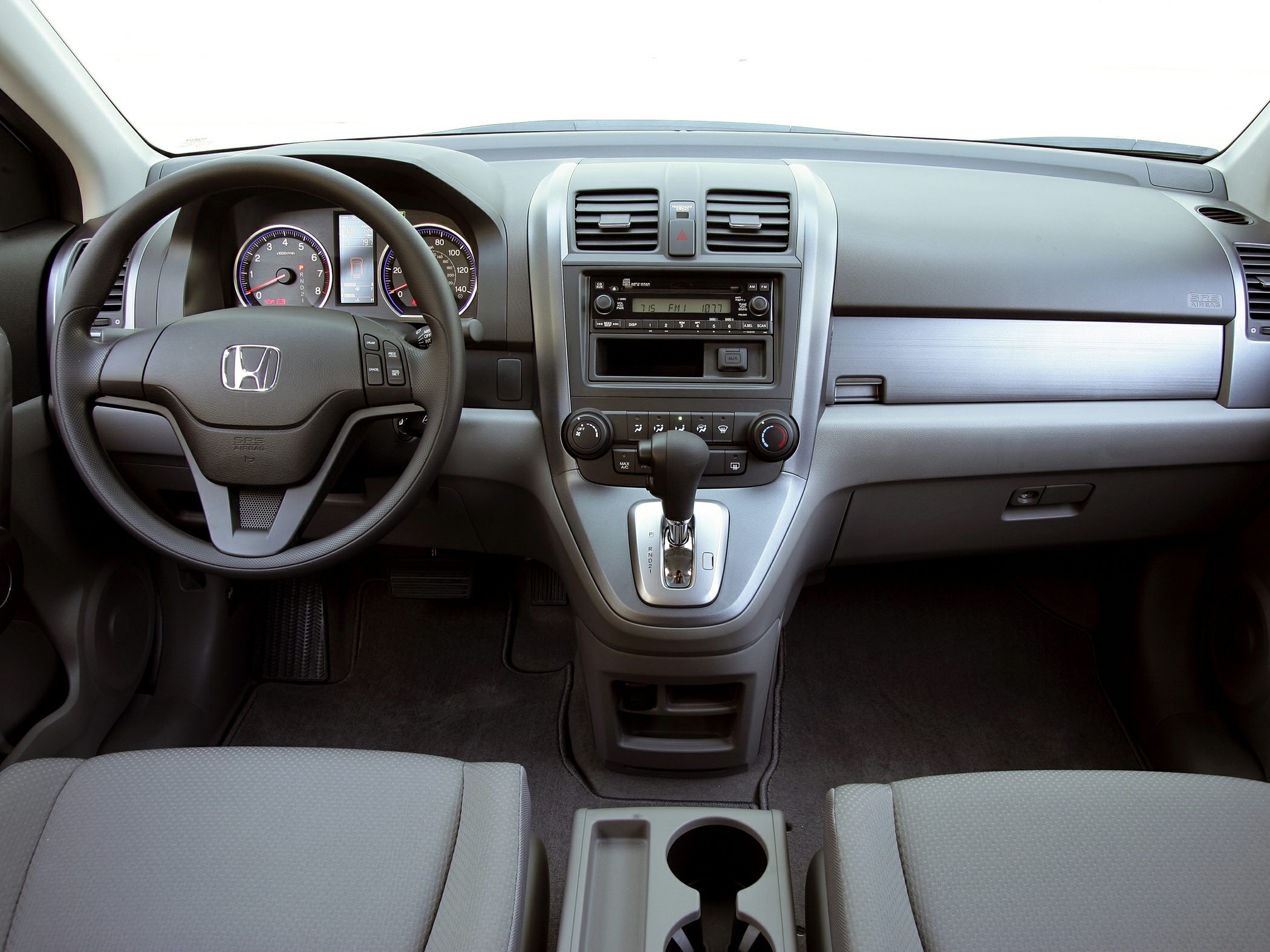 Dashboard and central console with steering wheel and gear shift