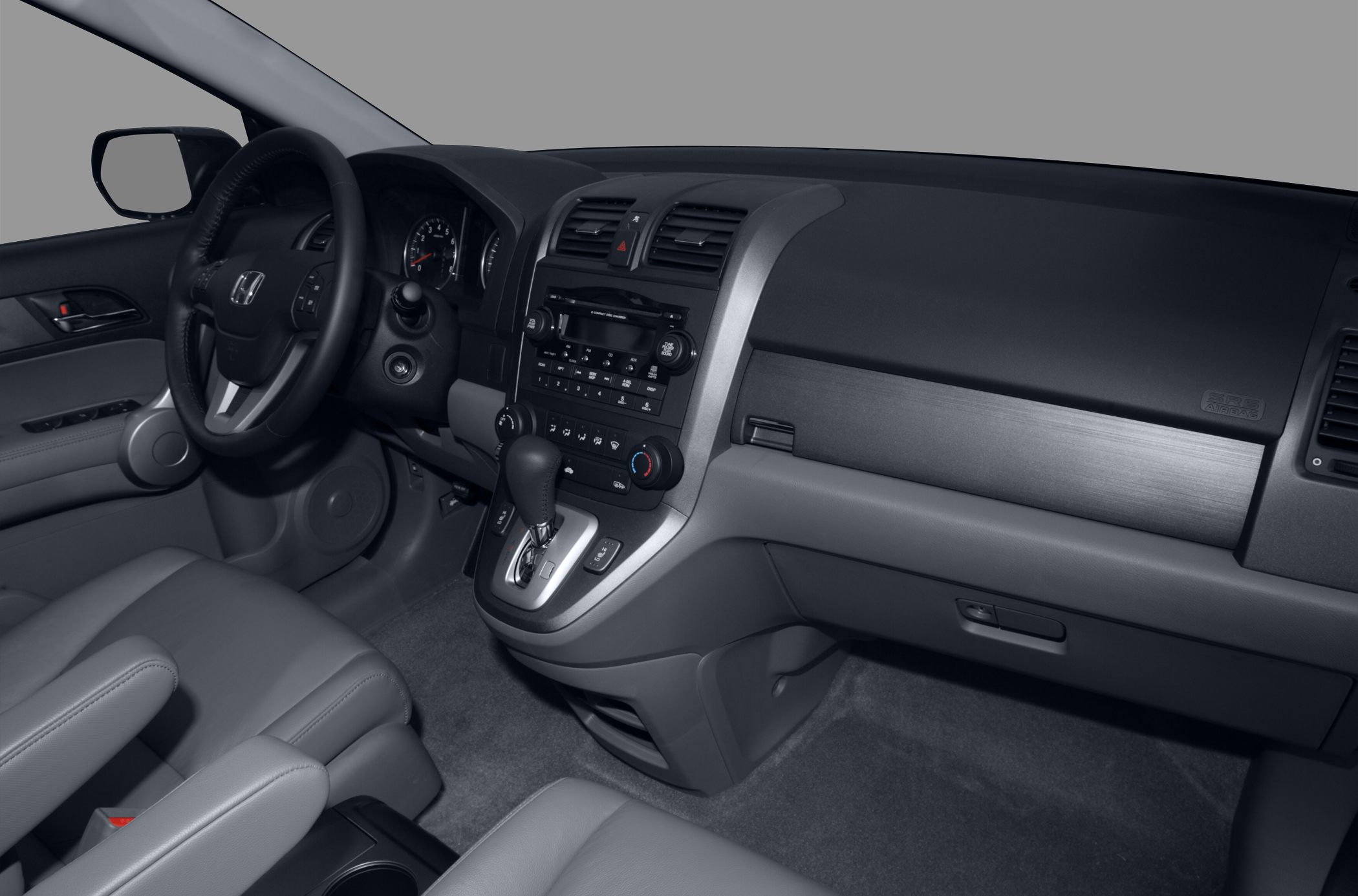 Dashboard and steering wheel with integrated controls