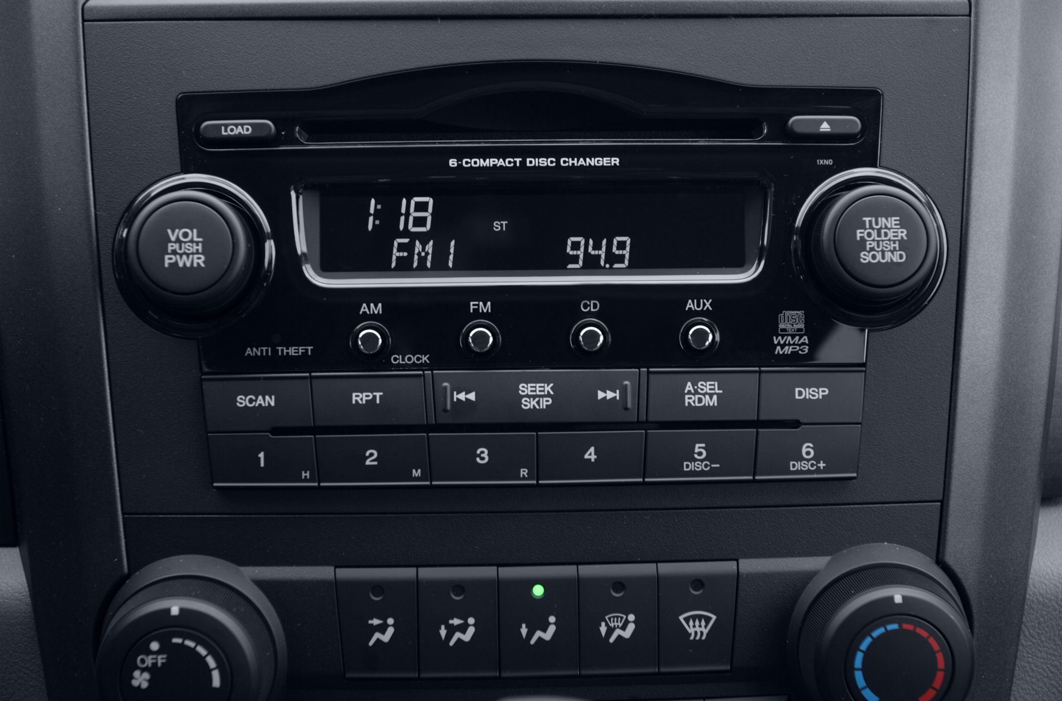 Car audio system with 6-CD changer and climate control panel