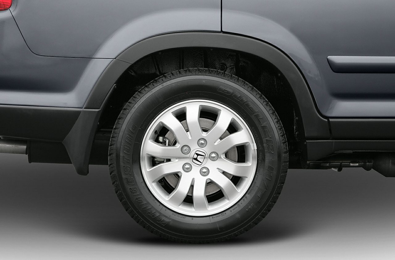 Alloy wheel with Bridgestone Dueler H/T tire on SUV
