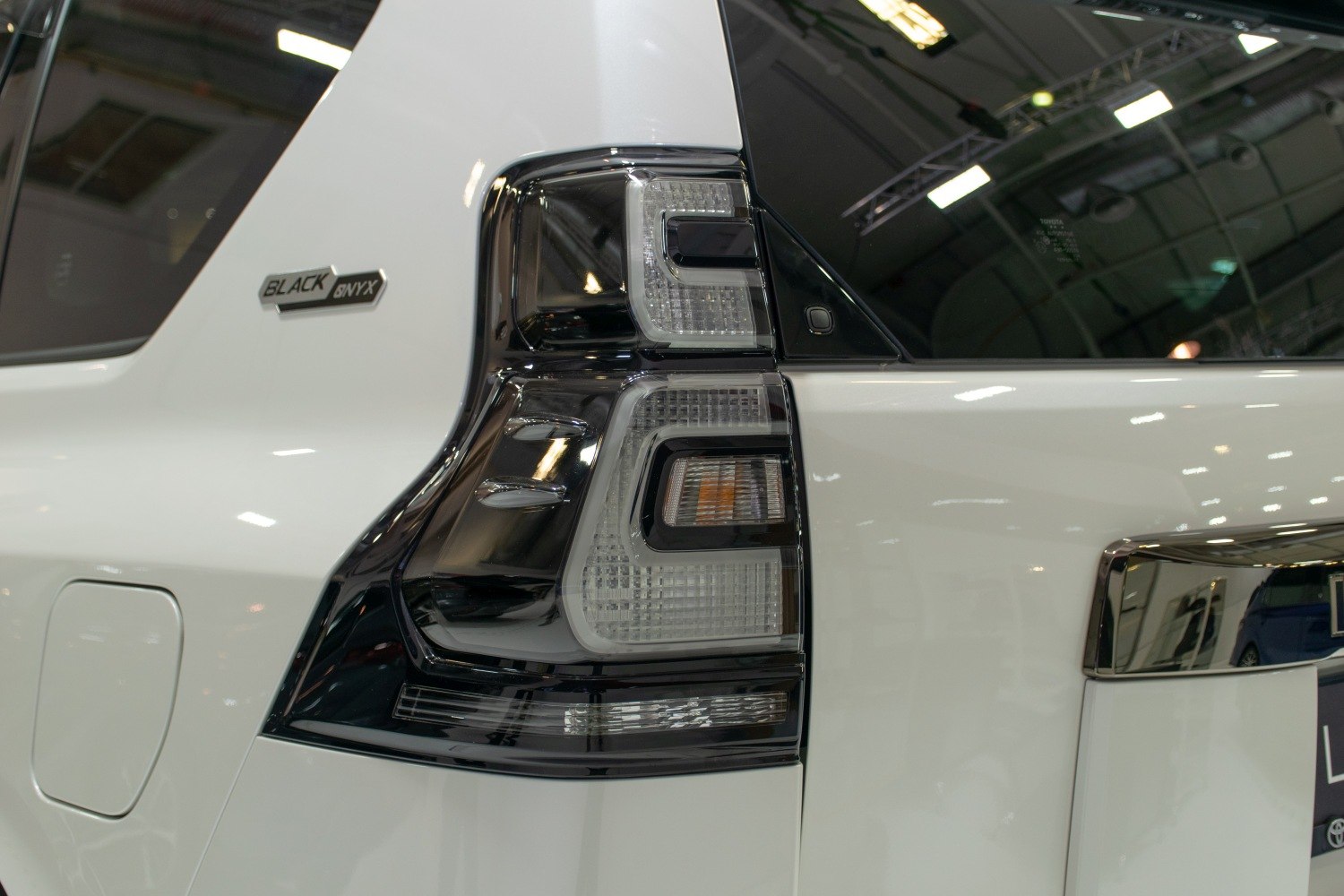 Close-up of a modern rear tail light and Black Onyx badge