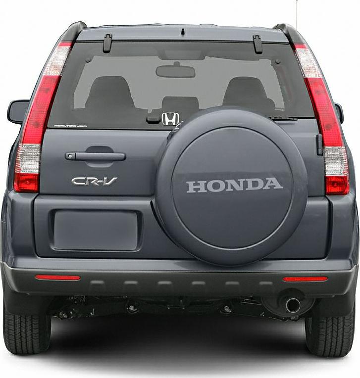 Rear view with spare tire cover and vertical tail lights.