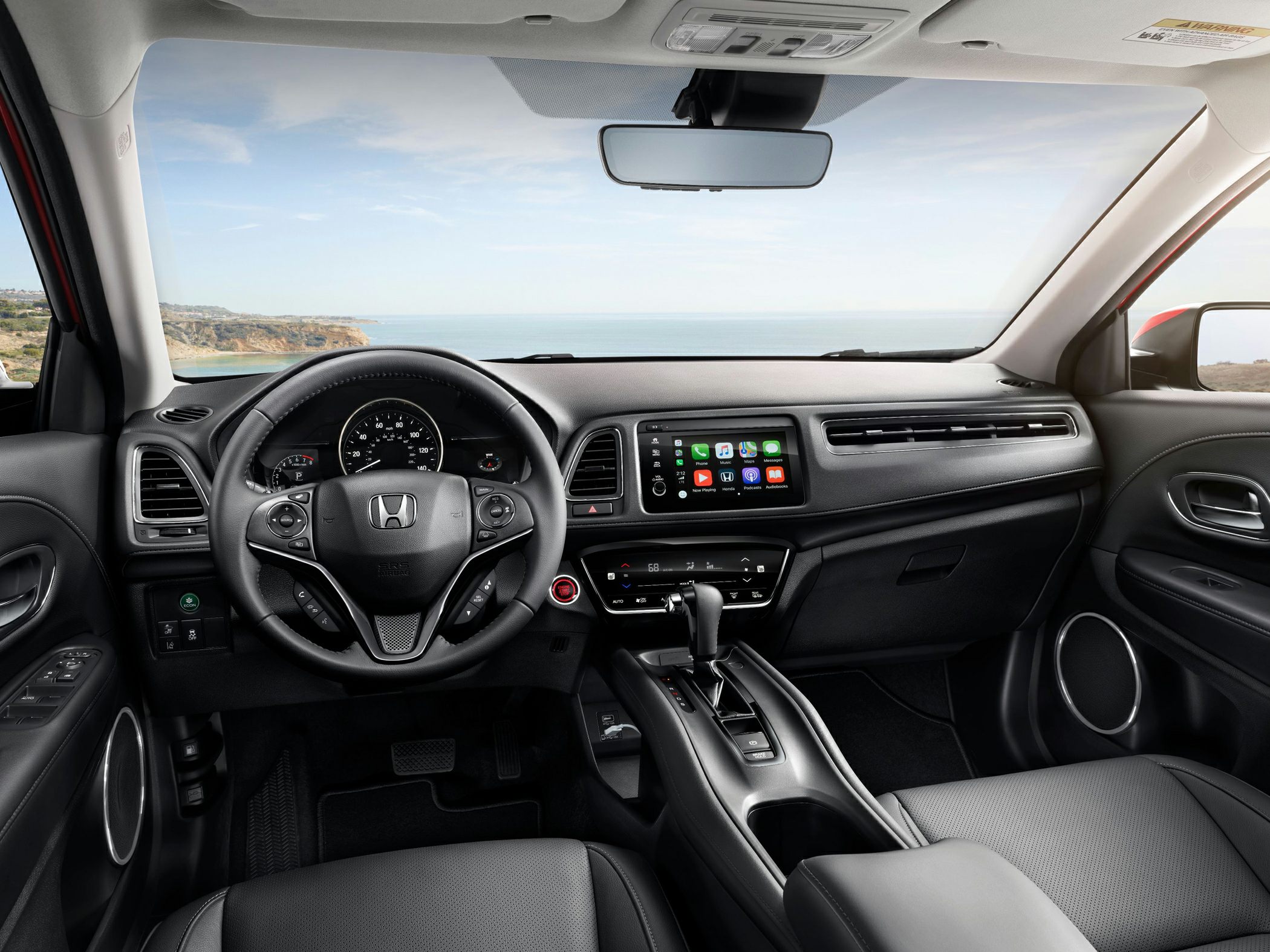 Interior dashboard with steering wheel and touchscreen infotainment system