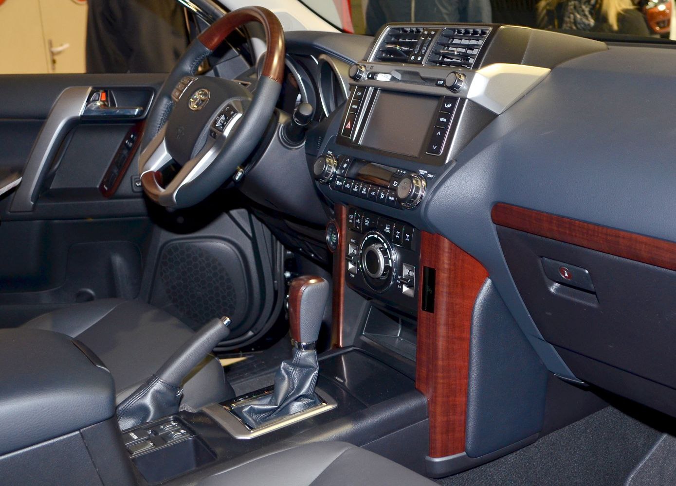 Dashboard and interior with wood trim and advanced control panel
