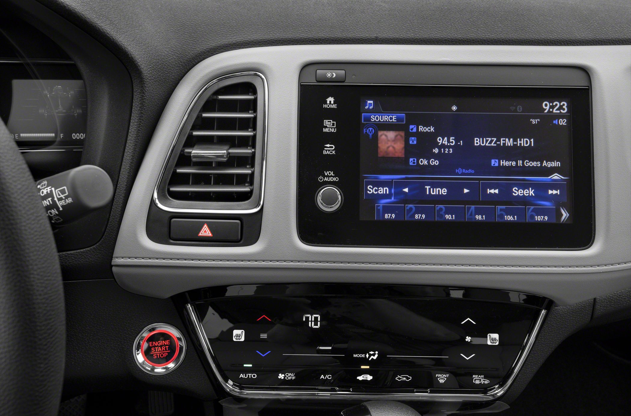 Dashboard infotainment and climate control panel with engine start button