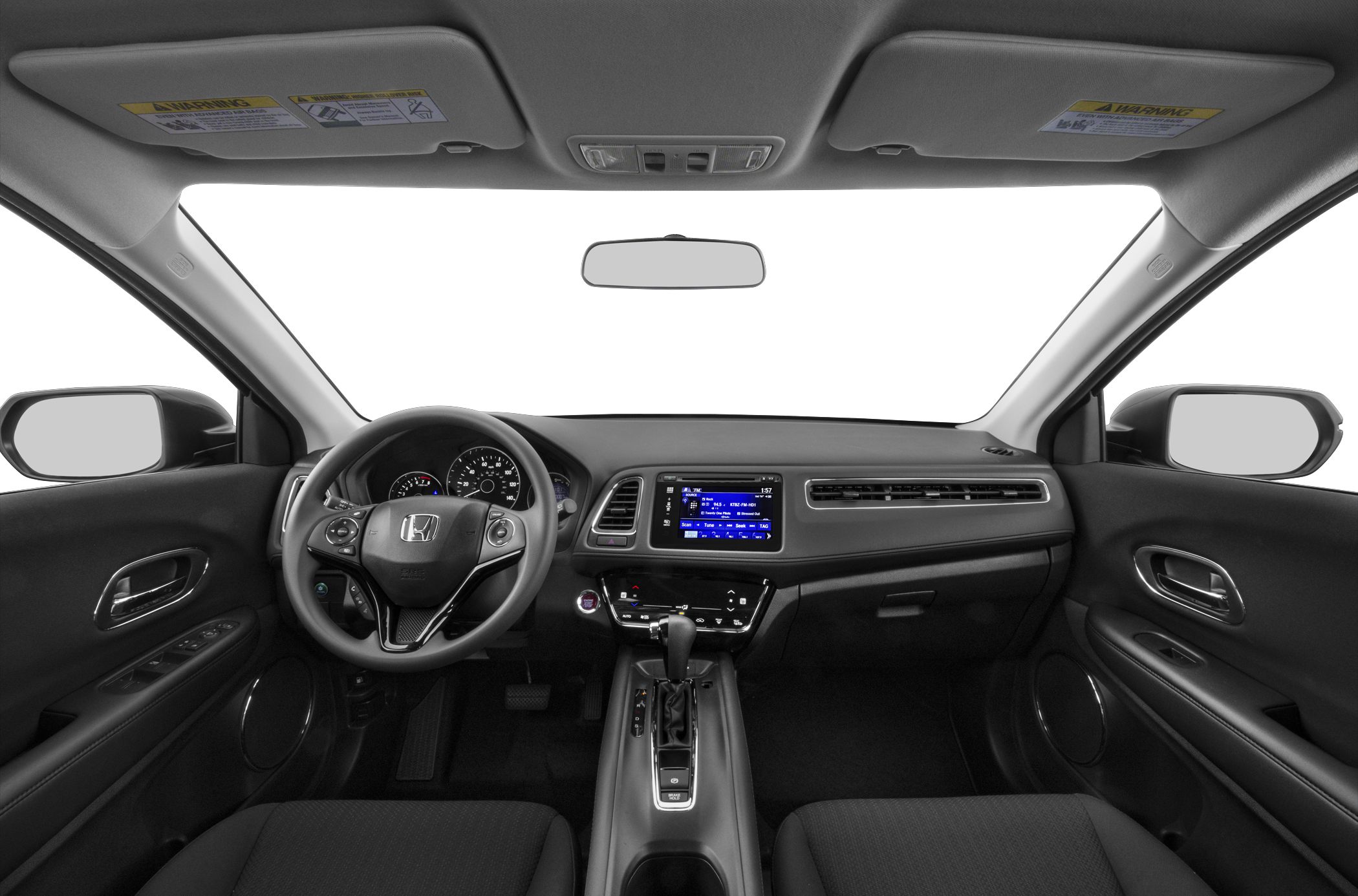 Dashboard and steering wheel with infotainment and control buttons.