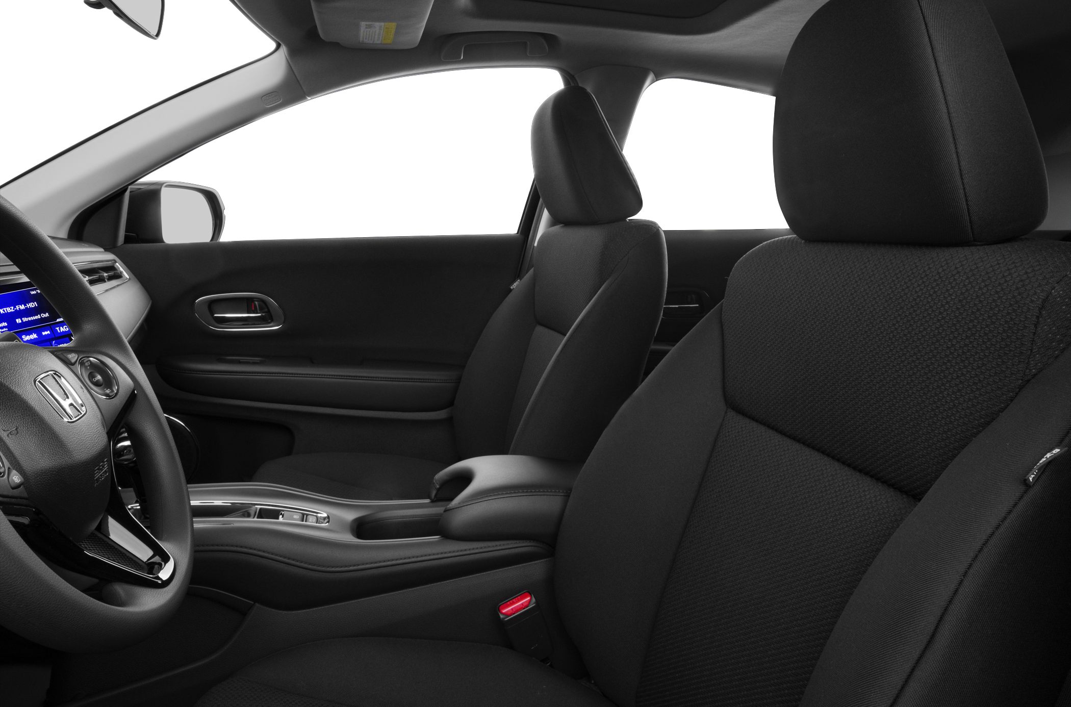 Front interior cabin with fabric seats and dashboard
