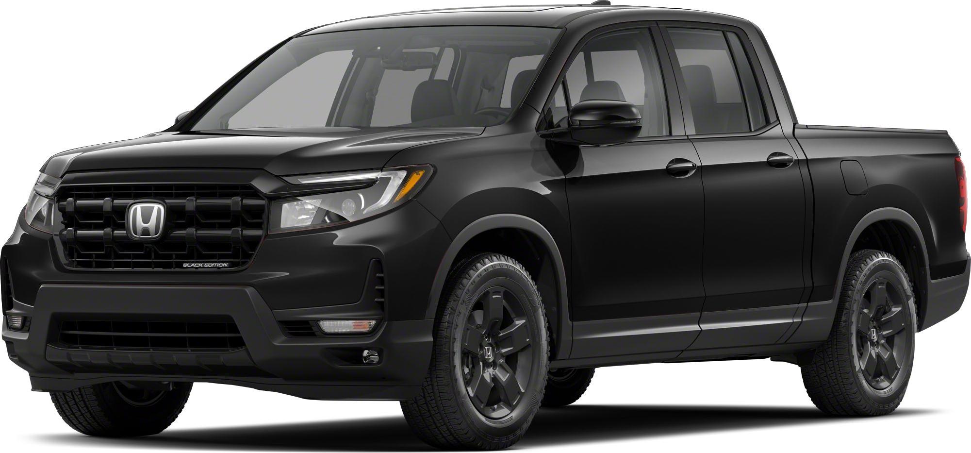 Front-side view of black pickup truck with sleek grille, black wheels