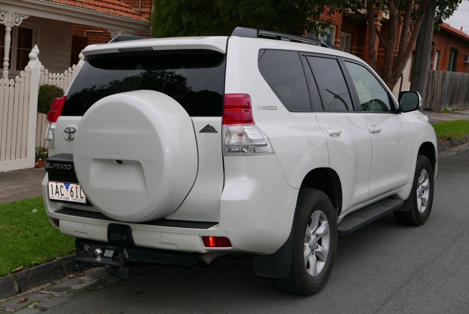 Rear view with spare wheel cover and D-4D turbo badge