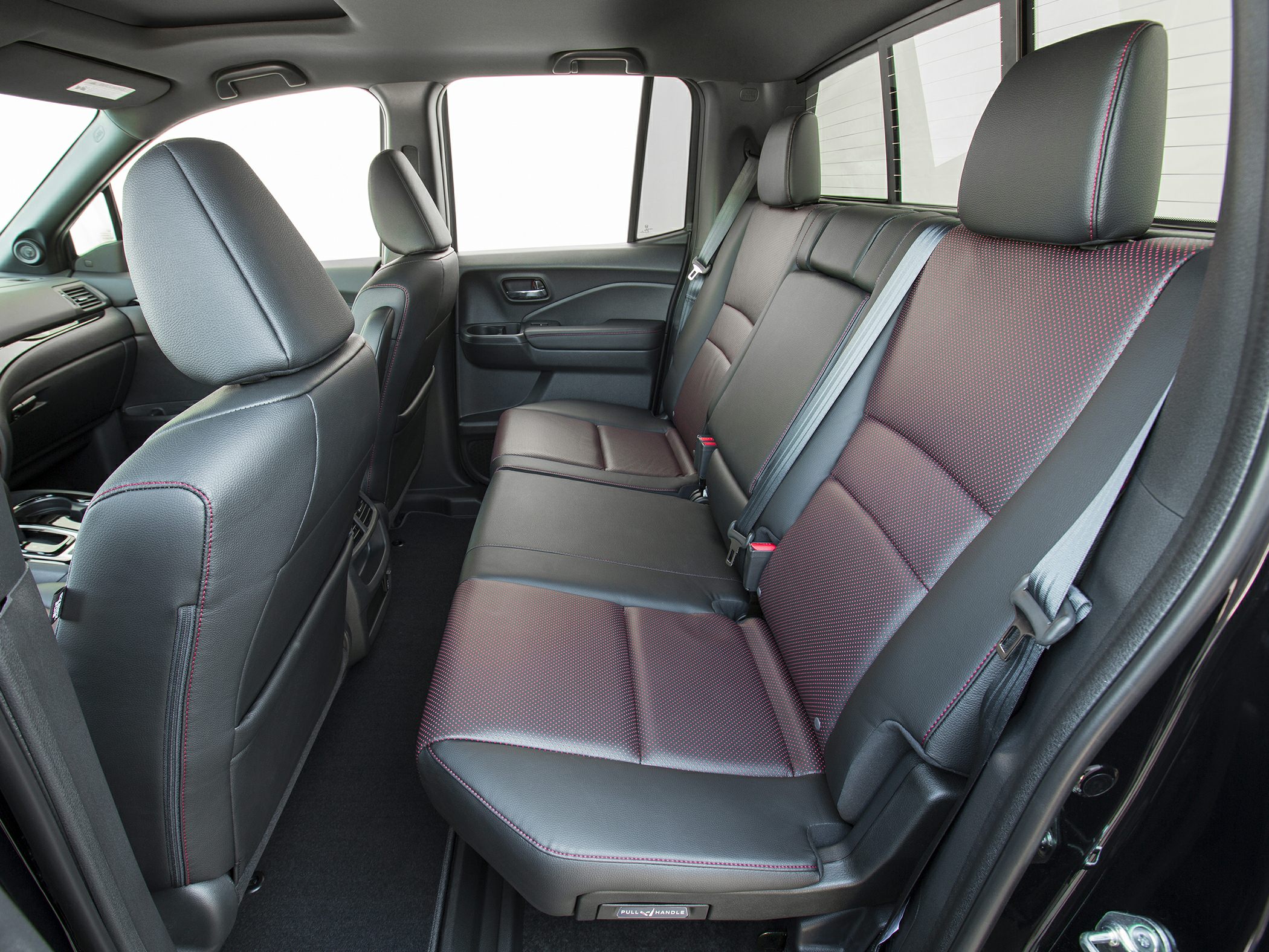 Spacious rear seat interior with premium upholstery and seat belts
