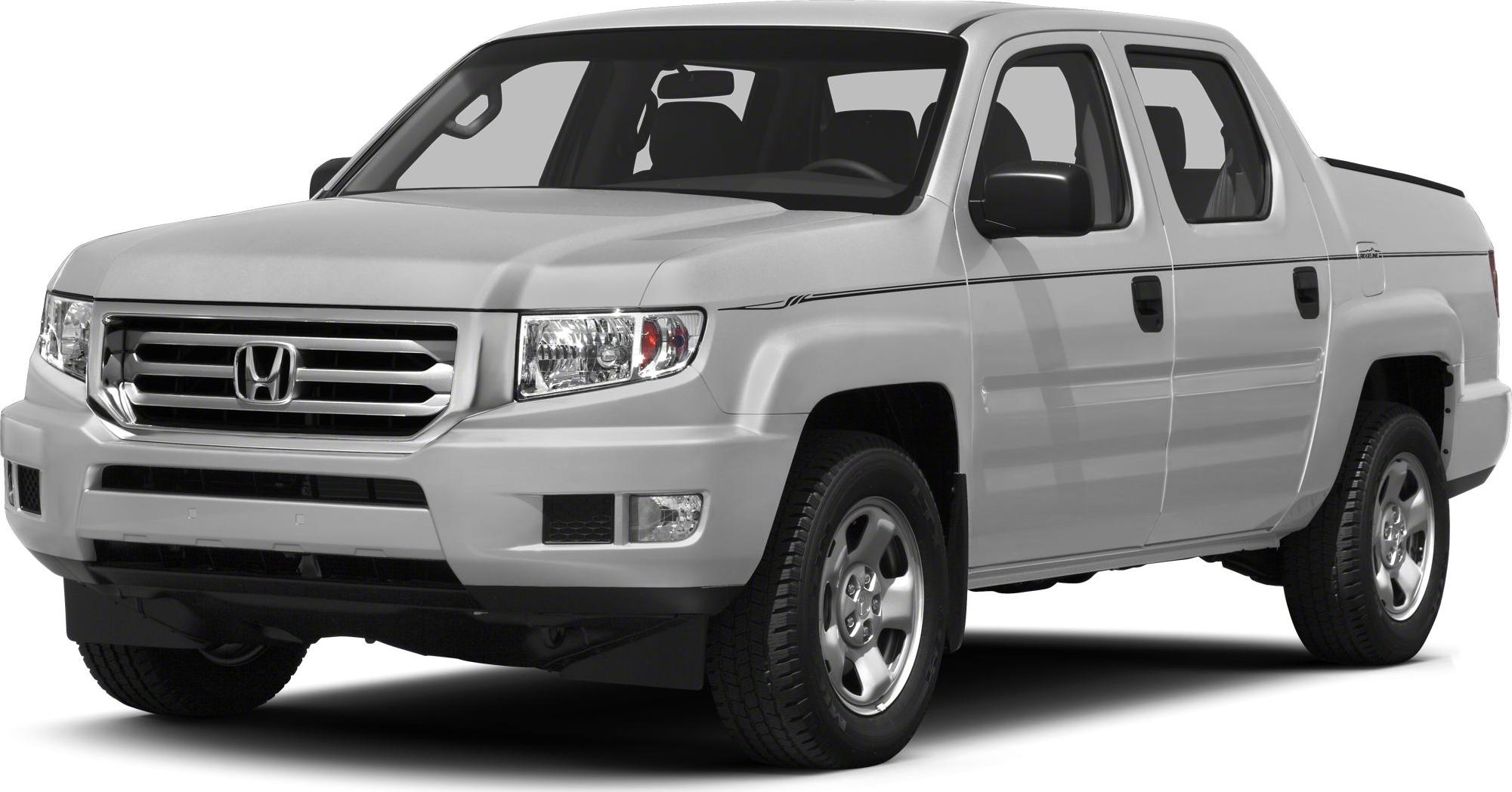 Pickup truck front and side view with distinctive grille and four doors