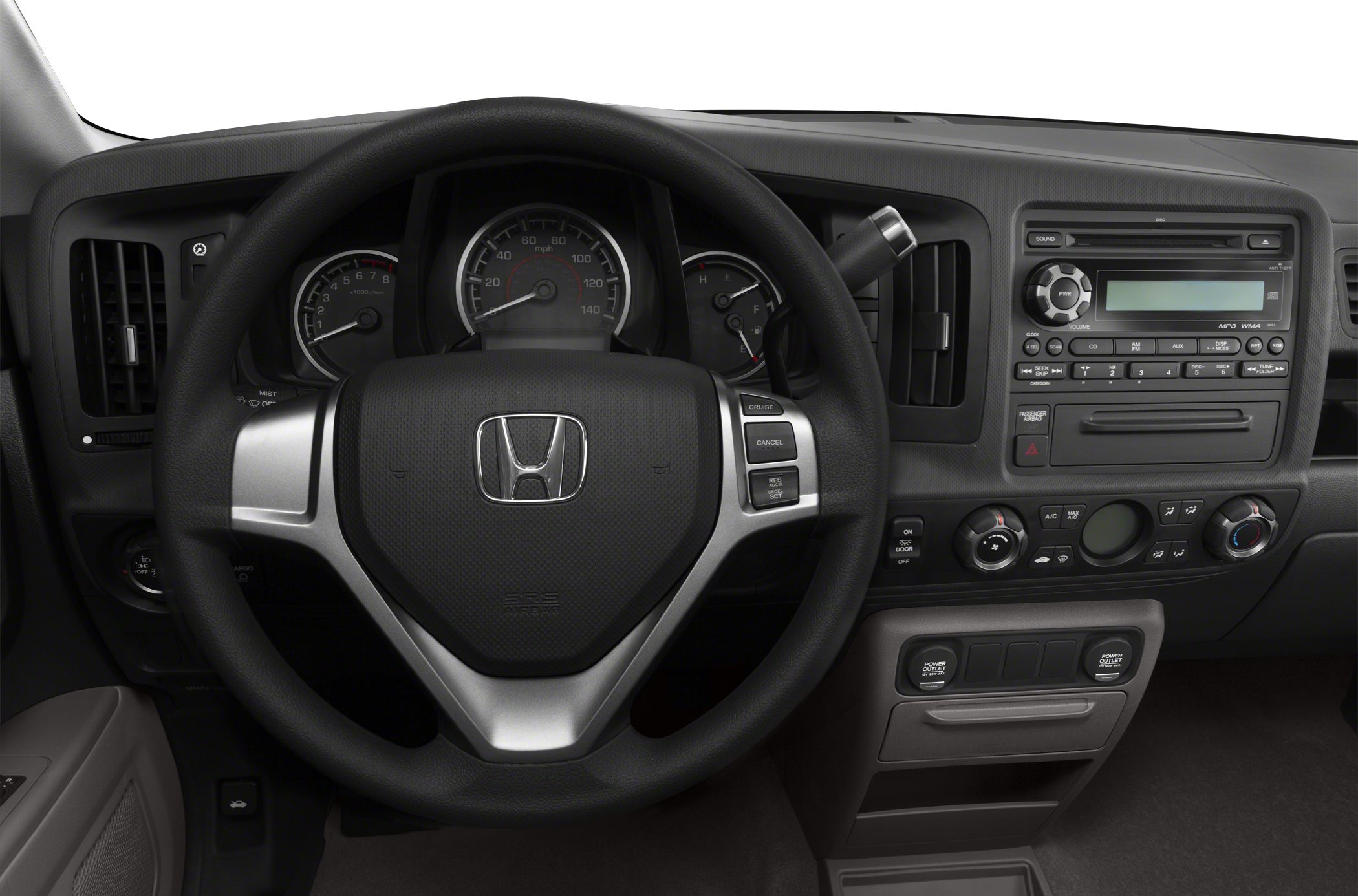 Dashboard and steering wheel with control buttons and gauges