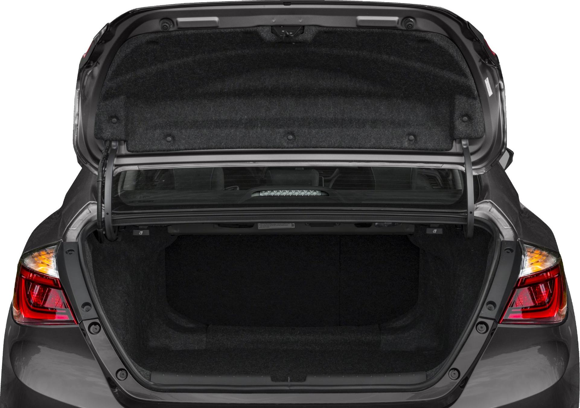 Open trunk with visible interior cargo space and illuminated rear lights.