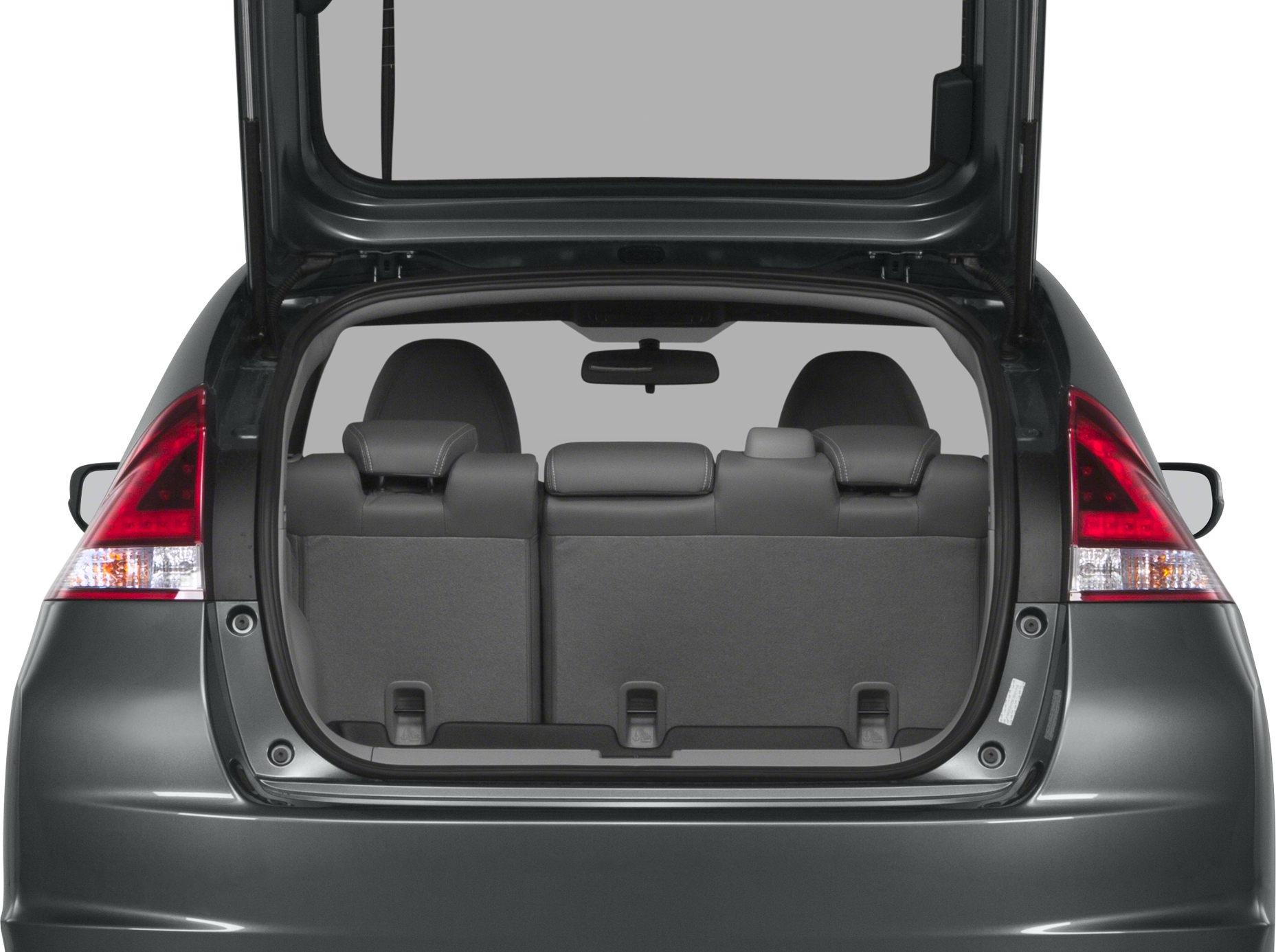 Open rear hatch and spacious cargo area with visible rear seats and taillights