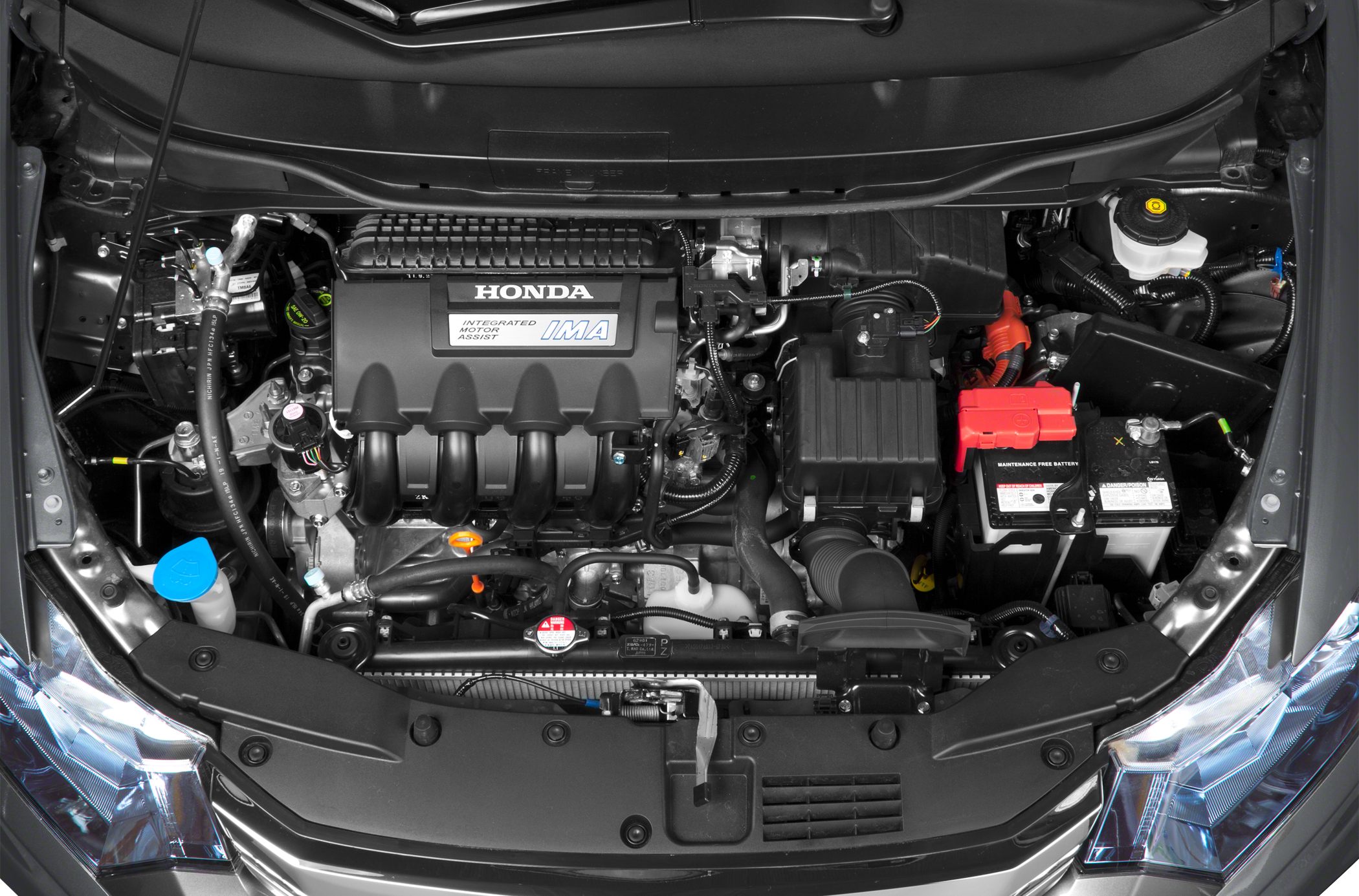Hybrid engine bay featuring Integrated Motor Assist system and battery.