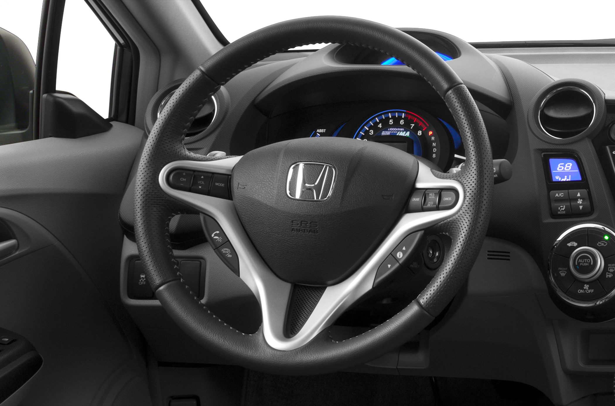 Steering wheel with embedded controls and illuminated dashboard cluster