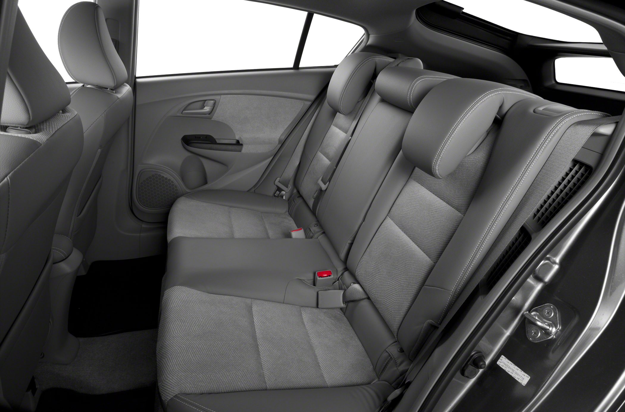Rear passenger seating with integrated headrests and door panel.
