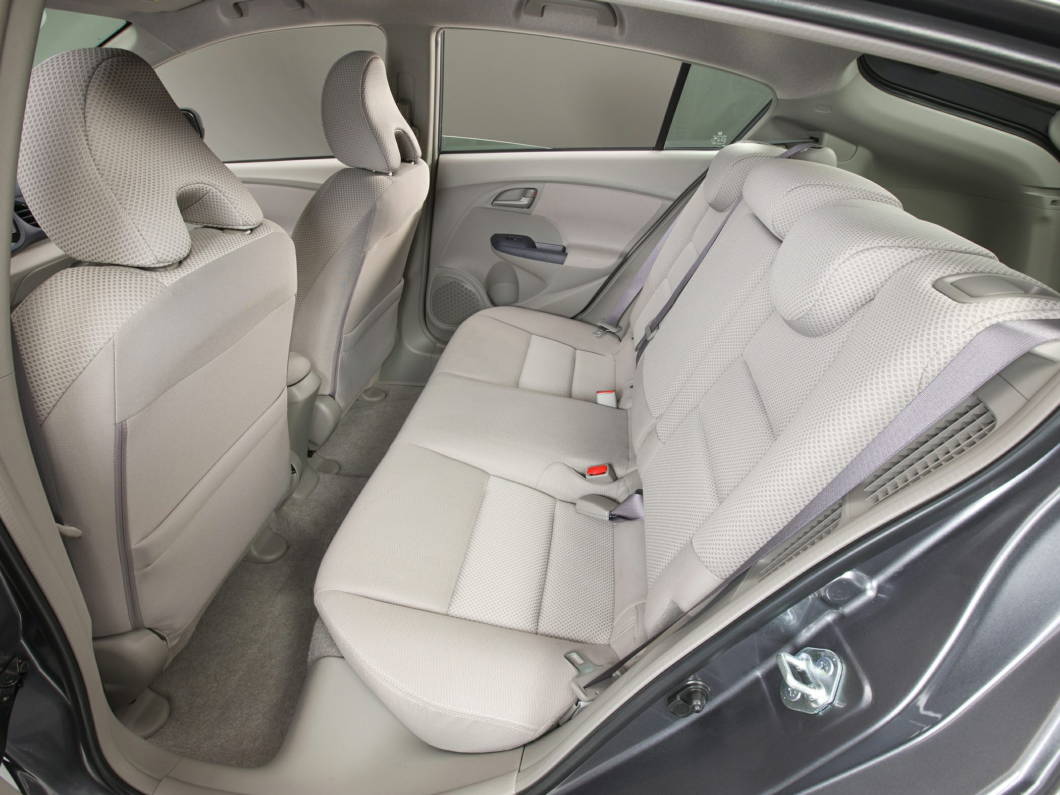 Fabric rear upholstery and ergonomic seating inside a compact car