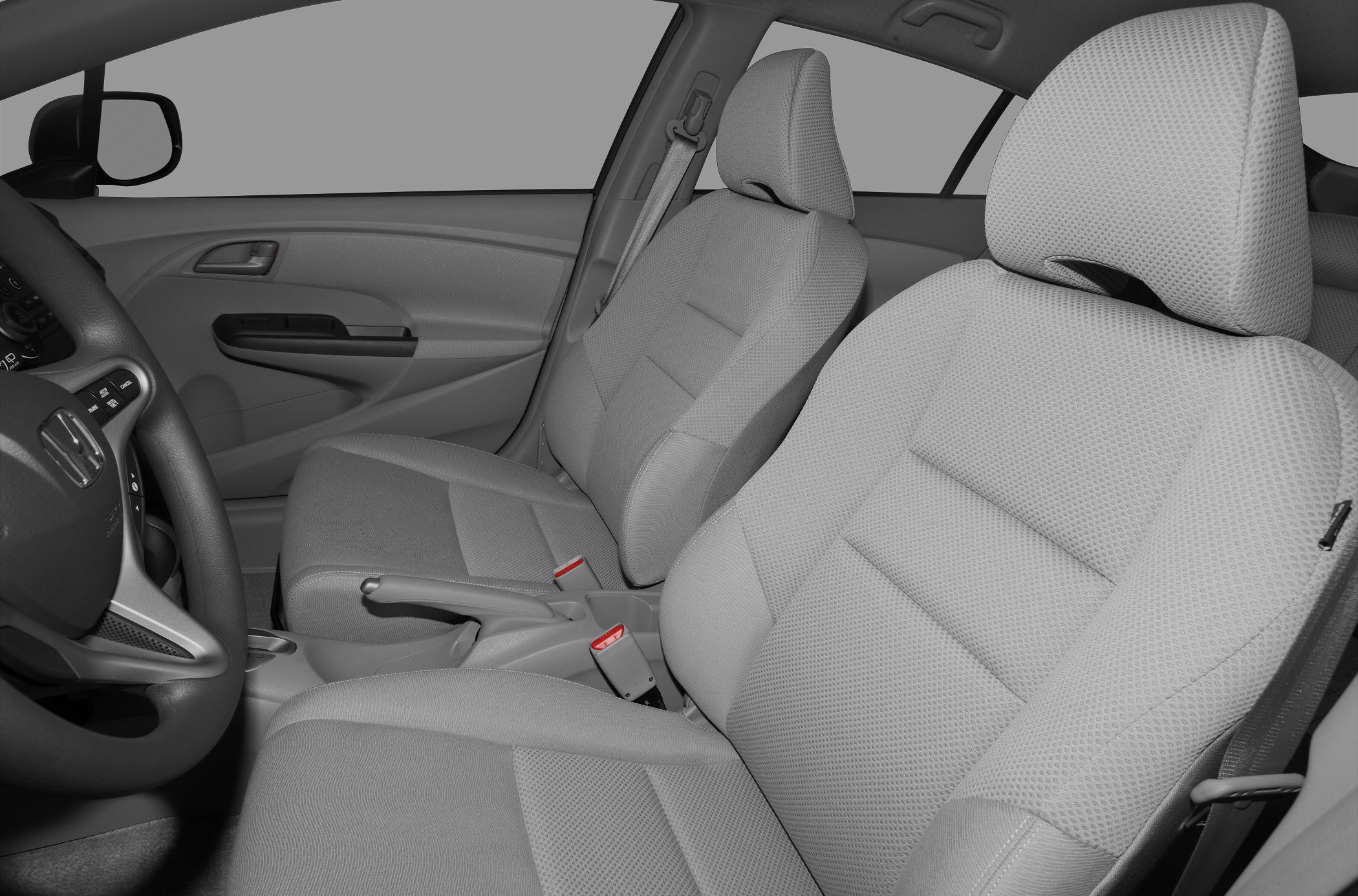 Front seats and door panel interior of a car