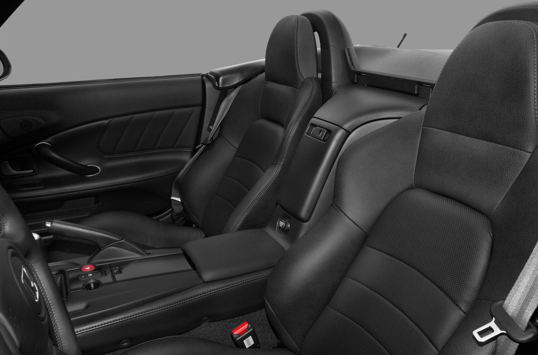 Black leather bucket seats and center console interior