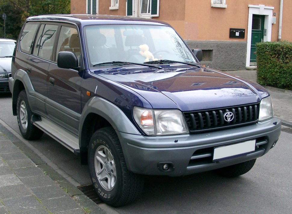 Front and side view of rugged 5-door SUV with alloy wheels and sturdy profile