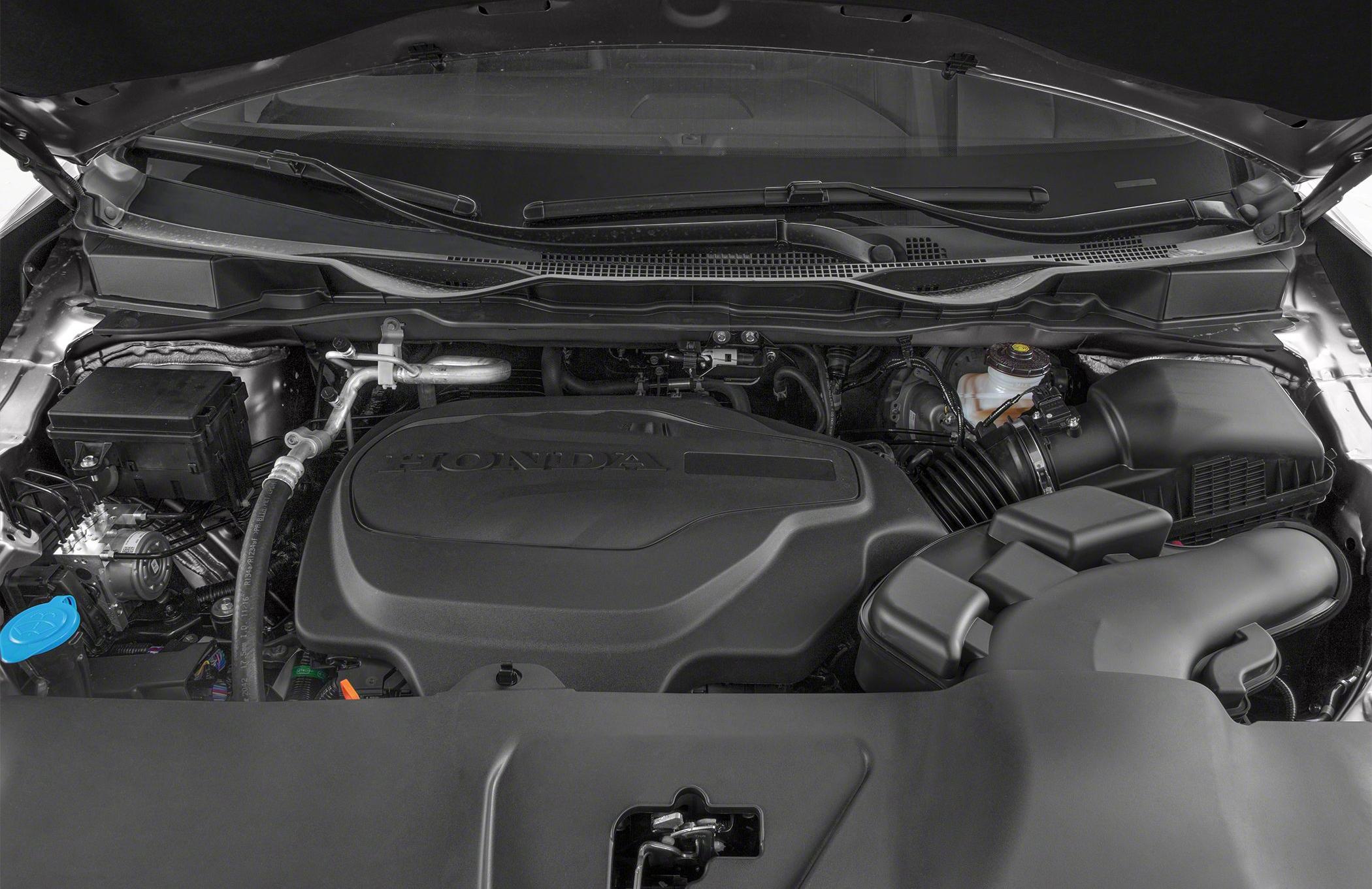 Modern engine bay with cover and organized components